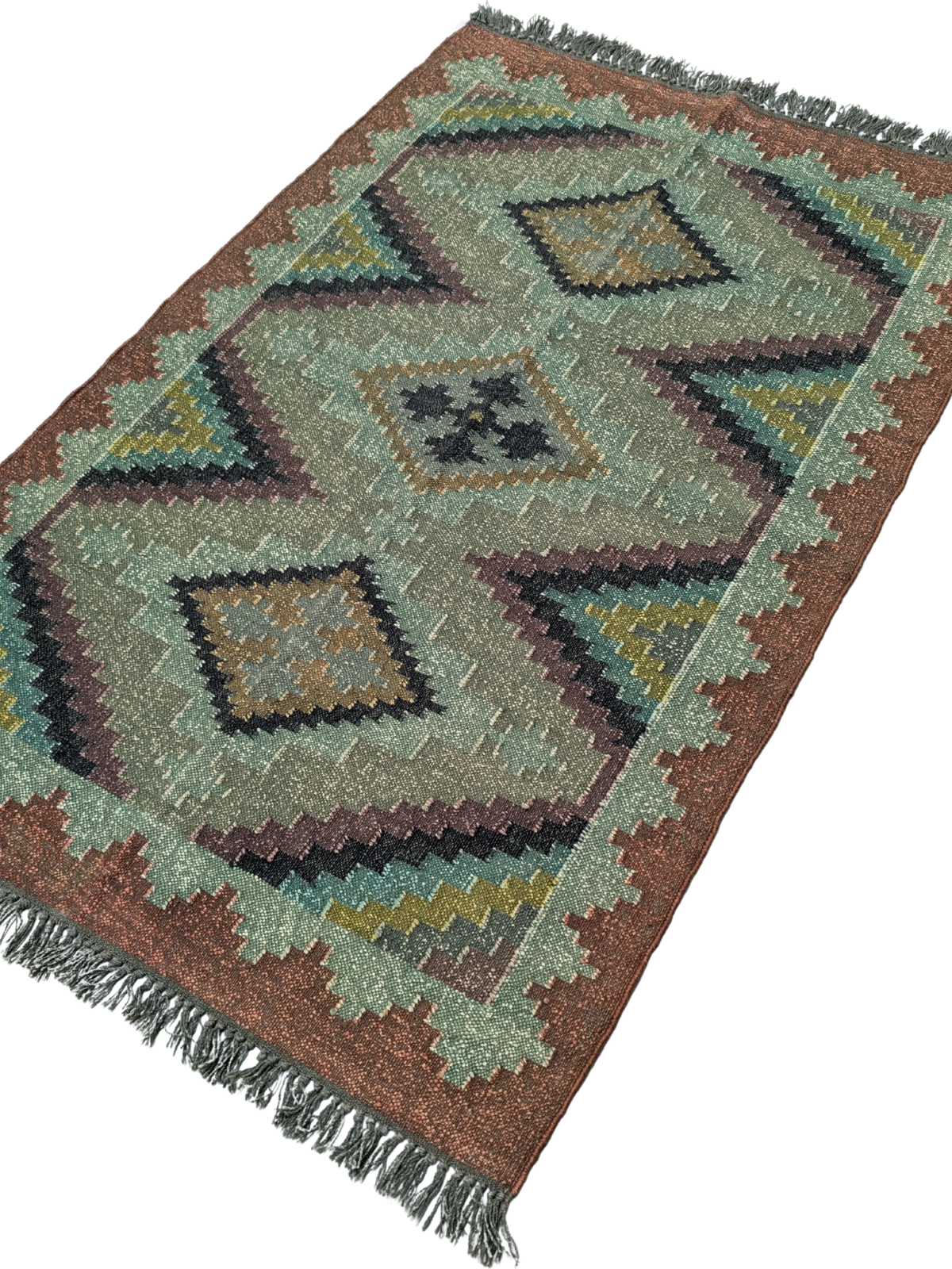 Inspired by the serene transition from day to night, the Dusk Haven Kilim Rug blends rich, moody hues with timeless geometric patterns. Handwoven by skilled artisans using premium wool, this flatweave rug features a mesmerizing diamond motif set against a soothing palette of deep teal, forest green, muted indigo, and earthy brown. The intricate stepped border adds a sense of structure while maintaining a soft, organic aesthetic.