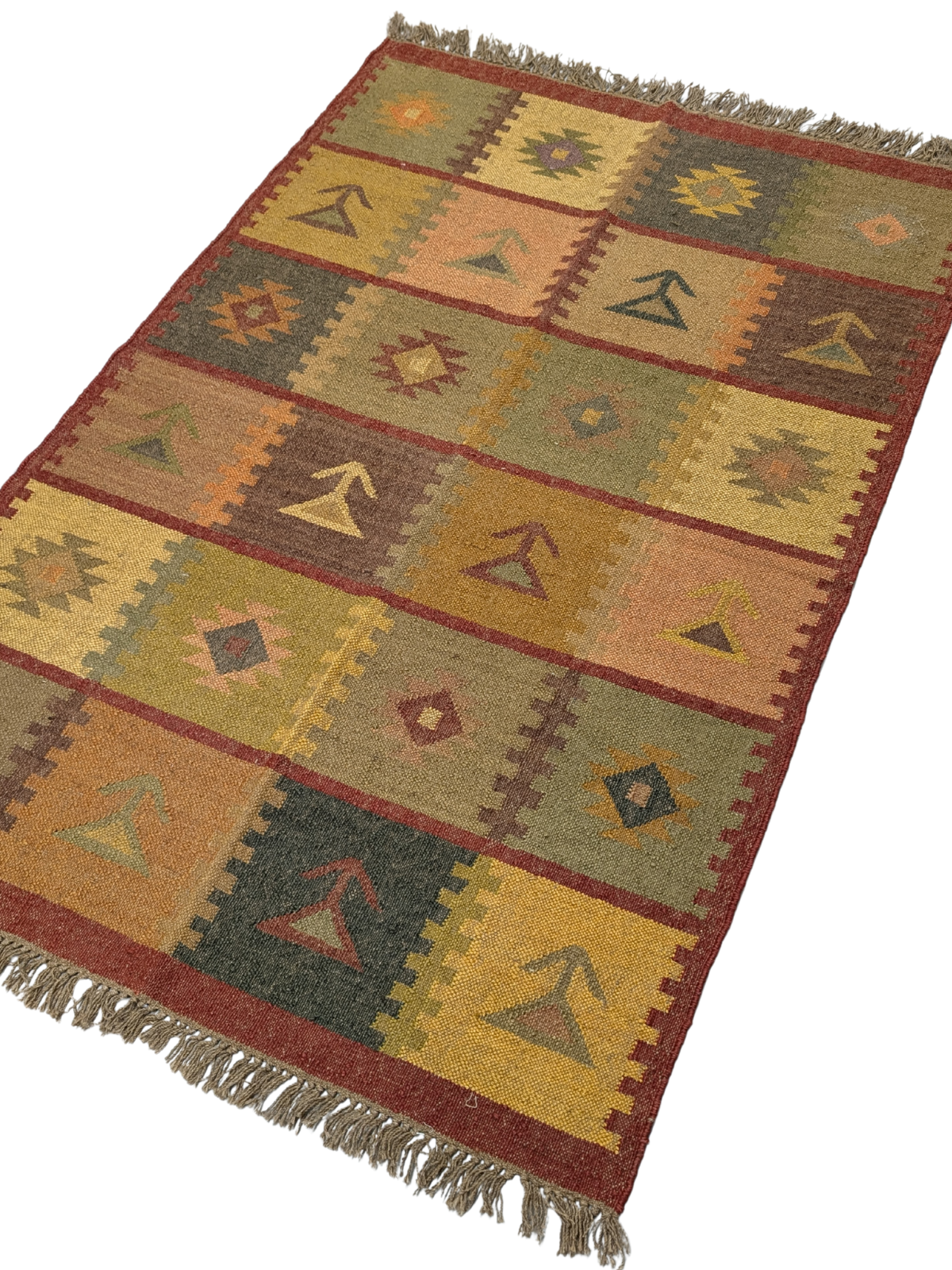 Inspired by the earthy hues of autumn fields, the Harvest Patch Kilim Rug is a timeless masterpiece that brings warmth and tradition into your home. Handwoven by skilled artisans using premium wool, this rug features a striking patchwork of geometric and tribal motifs, arranged in a harmonious grid-like formation. The palette of muted ochre, forest green, terracotta, deep maroon, and soft mustard captures the essence of nature’s bounty, making it a perfect addition to rustic, bohemian, or eclectic interiors