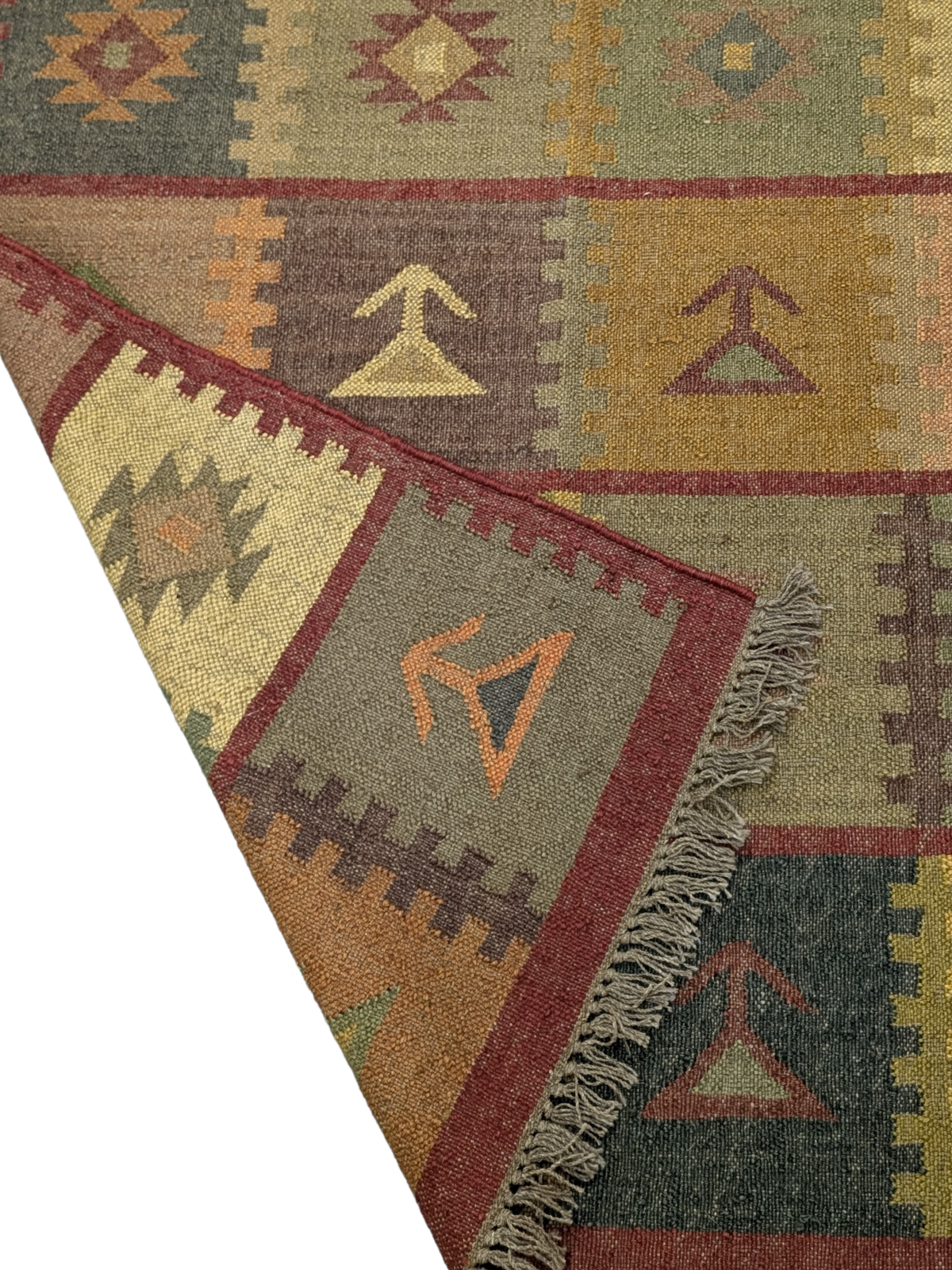 Inspired by the earthy hues of autumn fields, the Harvest Patch Kilim Rug is a timeless masterpiece that brings warmth and tradition into your home. Handwoven by skilled artisans using premium wool, this rug features a striking patchwork of geometric and tribal motifs, arranged in a harmonious grid-like formation. The palette of muted ochre, forest green, terracotta, deep maroon, and soft mustard captures the essence of nature’s bounty, making it a perfect addition to rustic, bohemian, or eclectic interiors