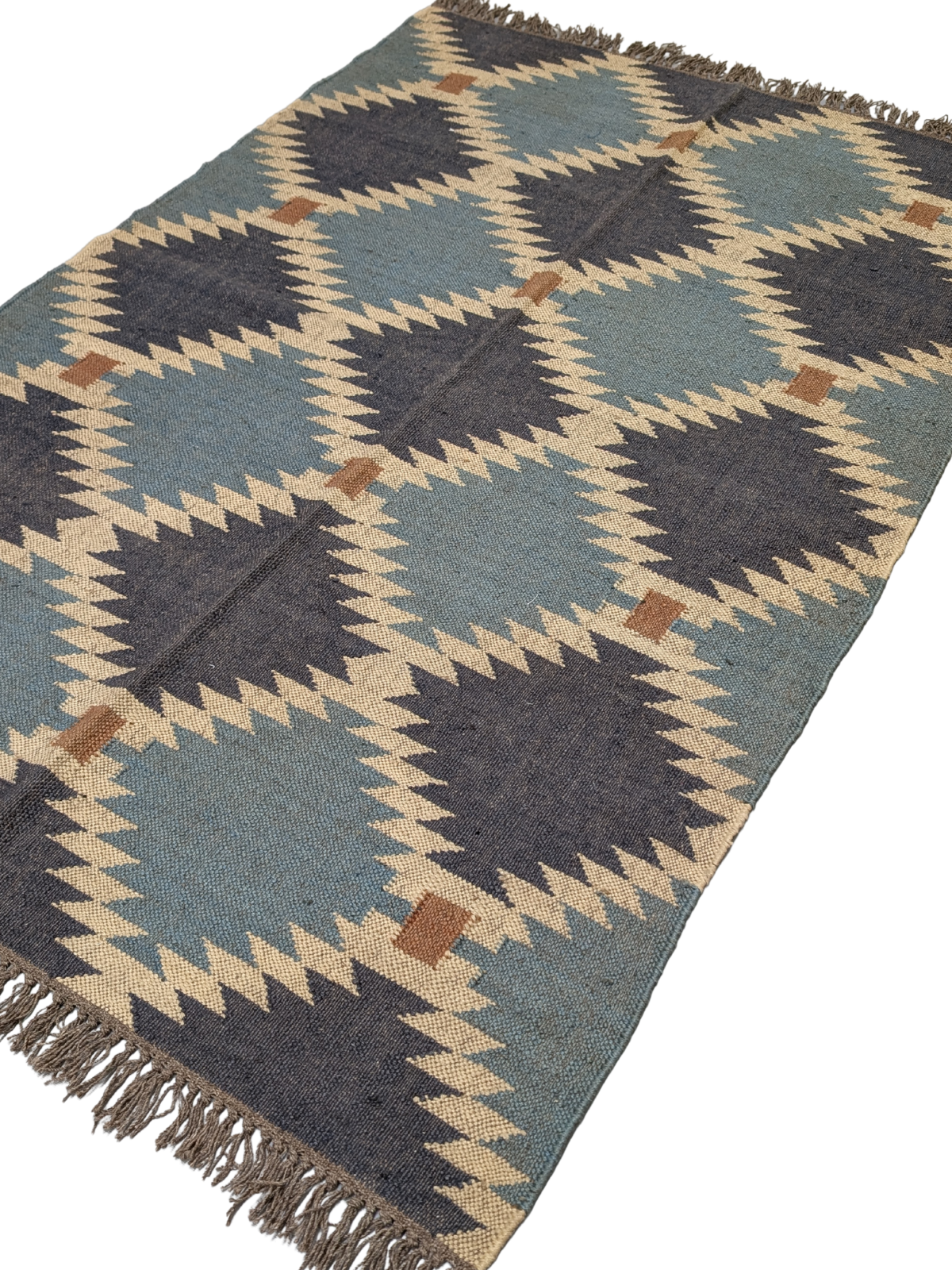 The Rustic Vistas Kilim Rug is a stunning handwoven masterpiece that blends timeless geometric design with a calming, earthy color palette. Featuring deep navy, soft sky blue, warm beige, and rustic brown, this flatweave wool rug is inspired by the natural landscapes of rolling hills and open skies. Its symmetrical tribal motifs create a bold yet balanced aesthetic, perfect for adding warmth and texture to your home.
