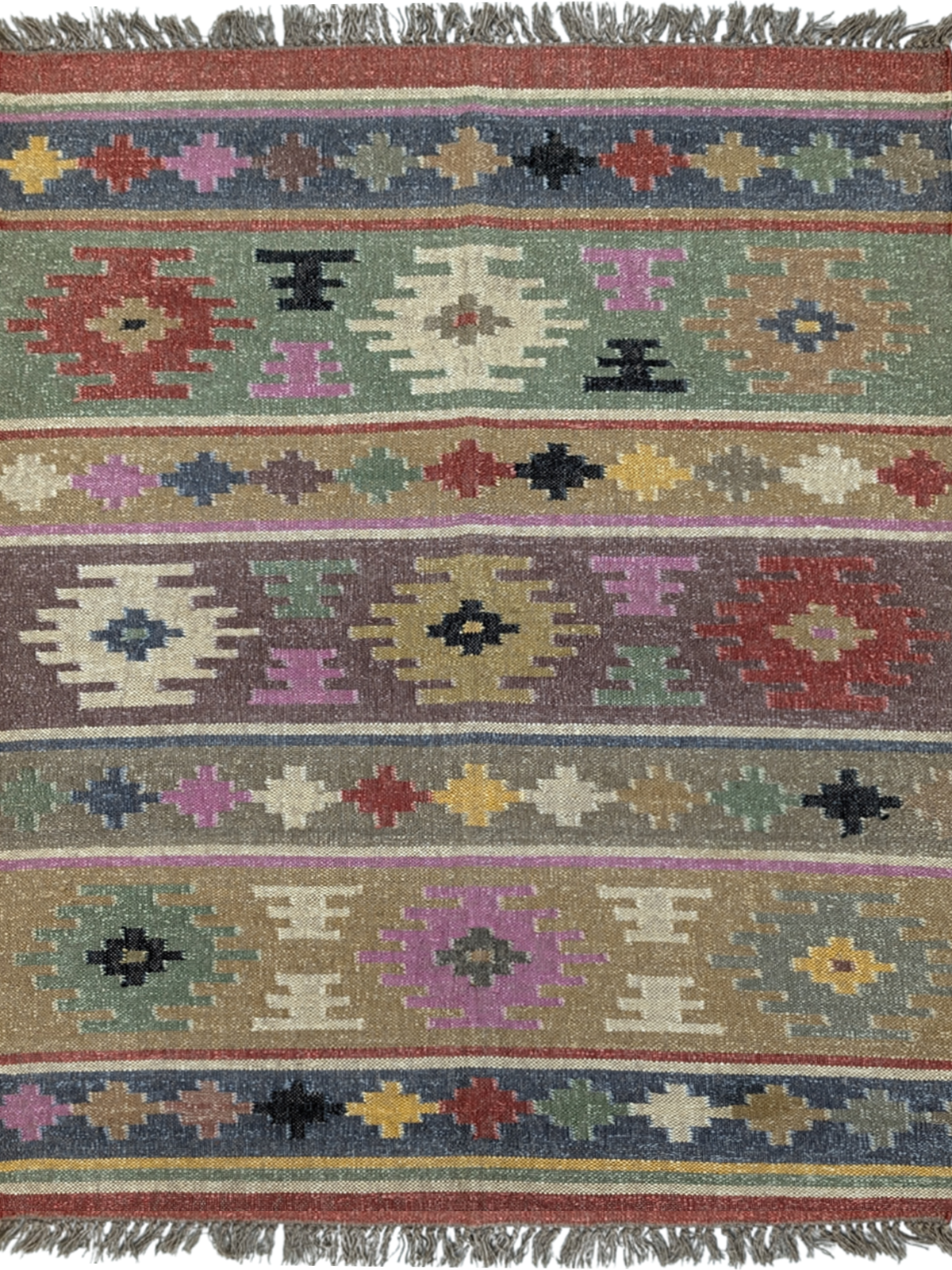 The Wanderer’s Mosaic Kilim Rug is a vibrant celebration of nomadic artistry, designed to infuse your space with eclectic charm and cultural richness. Handwoven by skilled artisans using premium wool, this rug showcases a mesmerizing patchwork of geometric and tribal motifs, arranged in striking horizontal bands. The warm, earthy palette—featuring deep reds, forest greens, golden yellows, rich purples, and soft neutrals—evokes the spirit of adventure and storytelling found in traditional kilim designs.