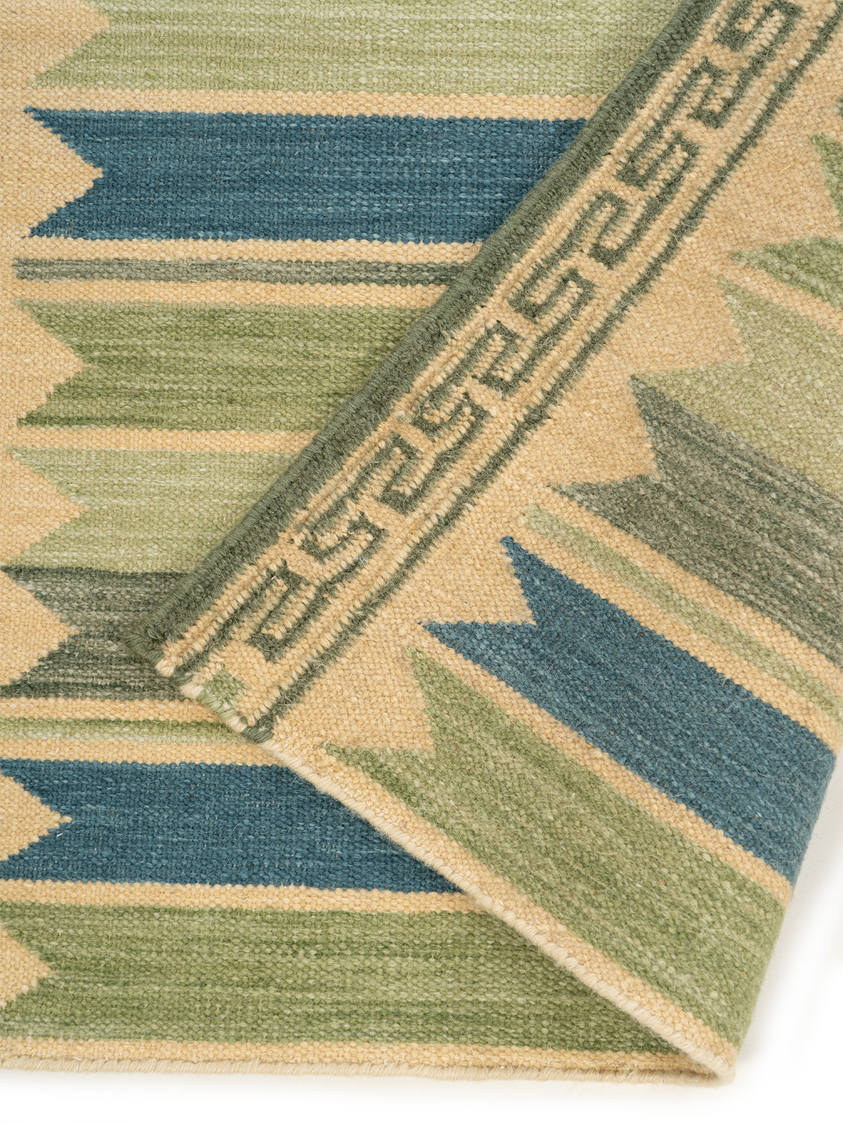 Aegean Block Border Runner detail showing edge binding and wool finishing of the runner