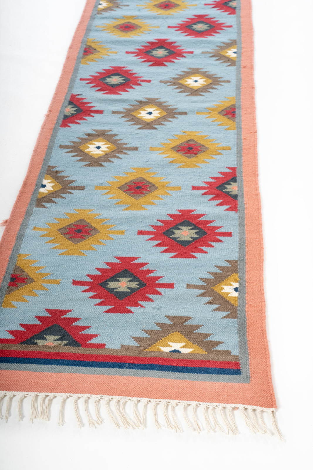 Ajmer Reflection Wool Runner wool stair runner styled on a staircase in a designed interior