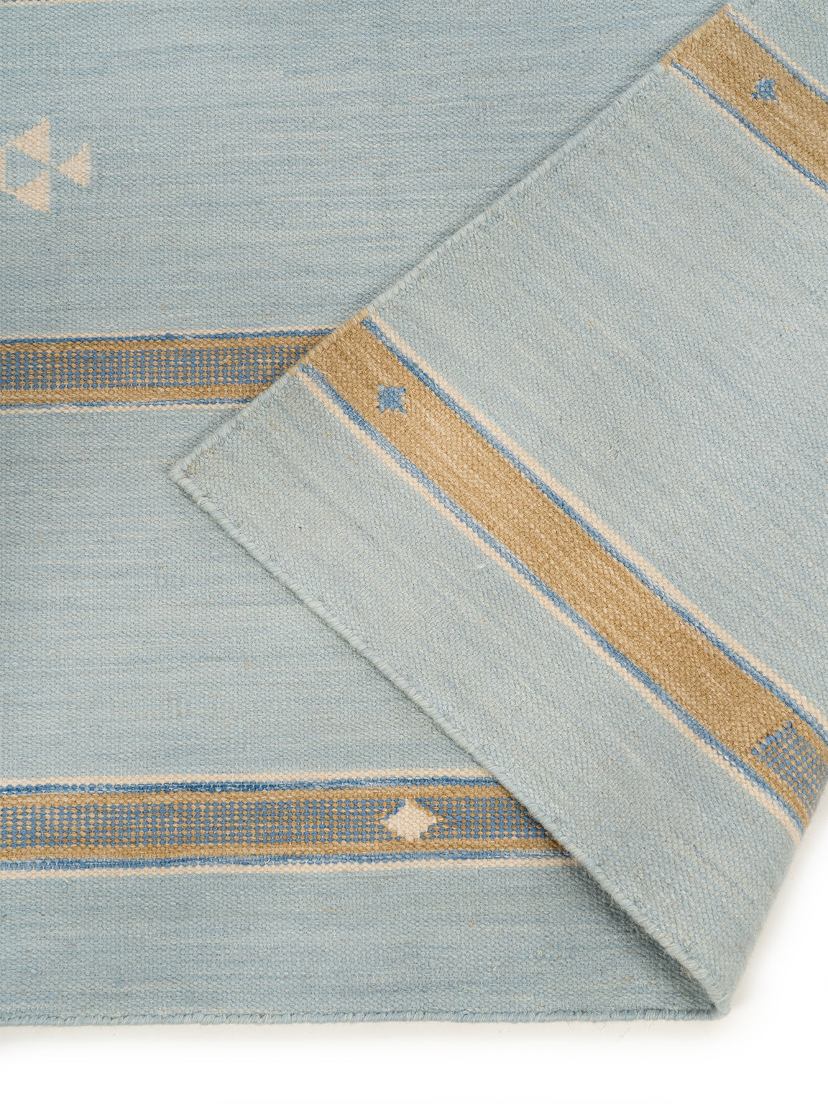 Aqua Shoal Wool Rug detail showing the textured wool surface and finishing