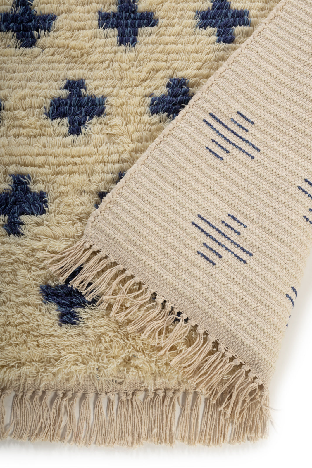 Arctic Bloom Wool Rug detail of the floral motif in wool cut pile