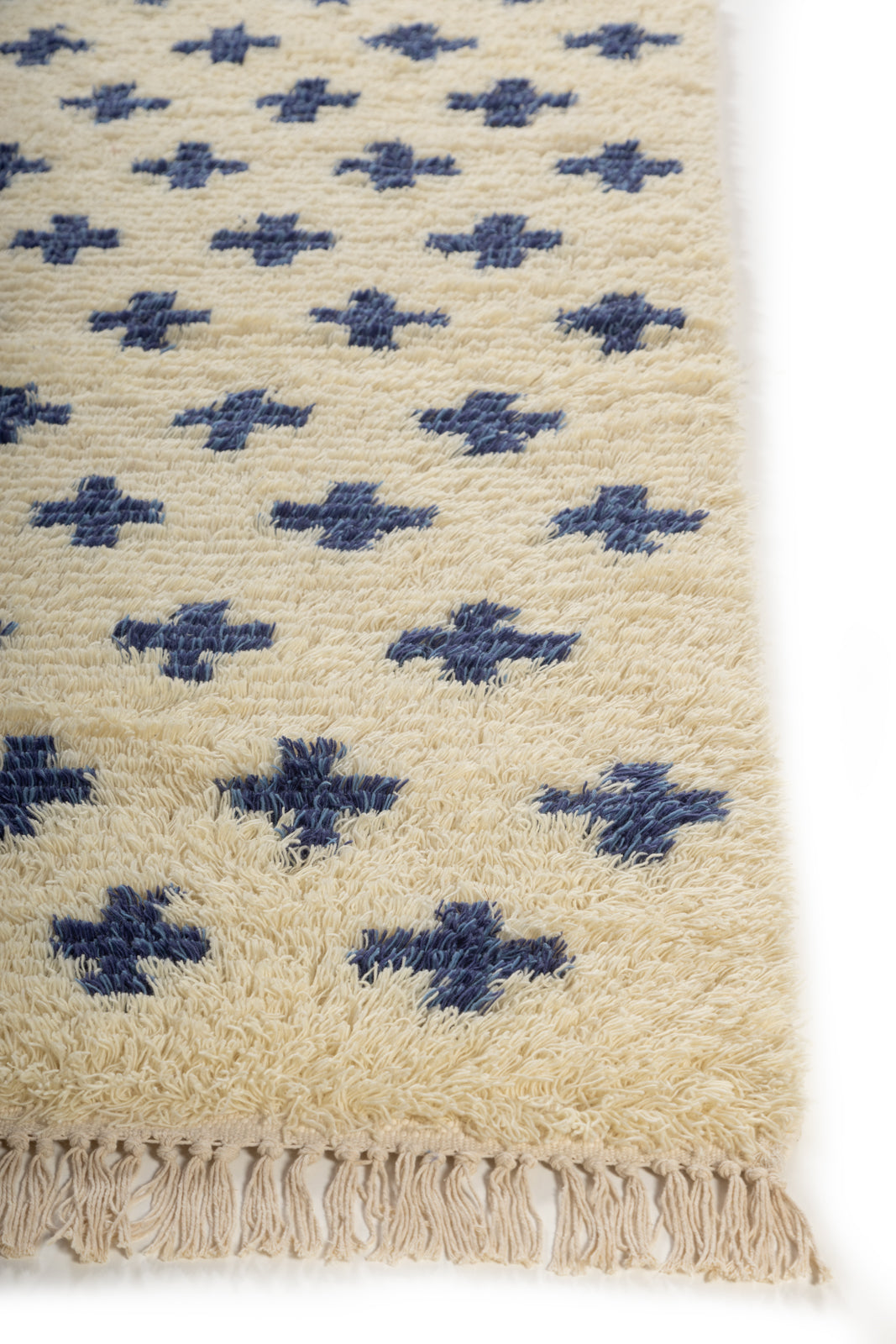 Arctic Bloom Wool Rug wool rug styled in a living room interior