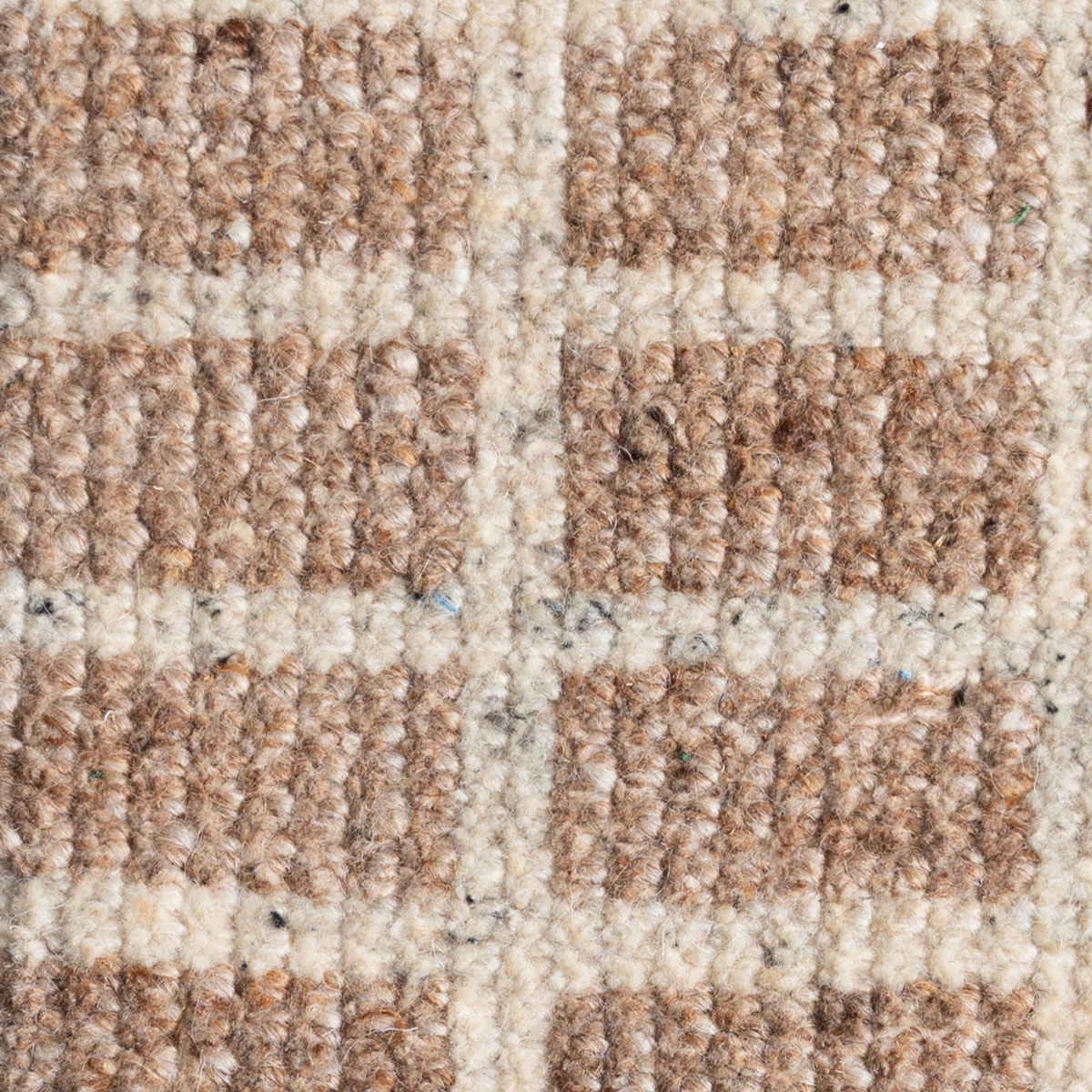 Artisan's Trace : Colonnade close-up showing the wool weave and geometric motif