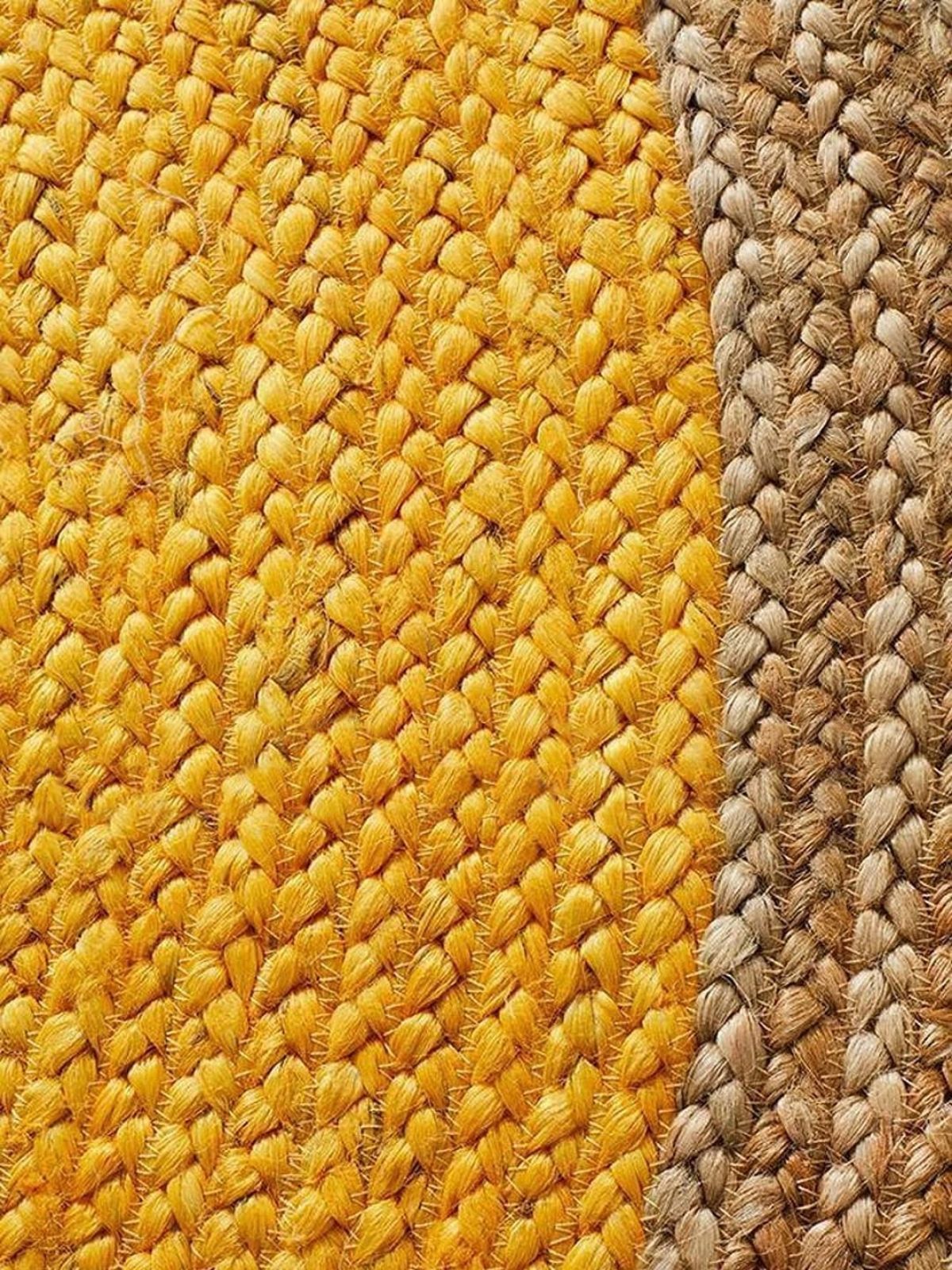 Asmara bordered round rug-Chrome detail showing the textured cotton surface and finishing