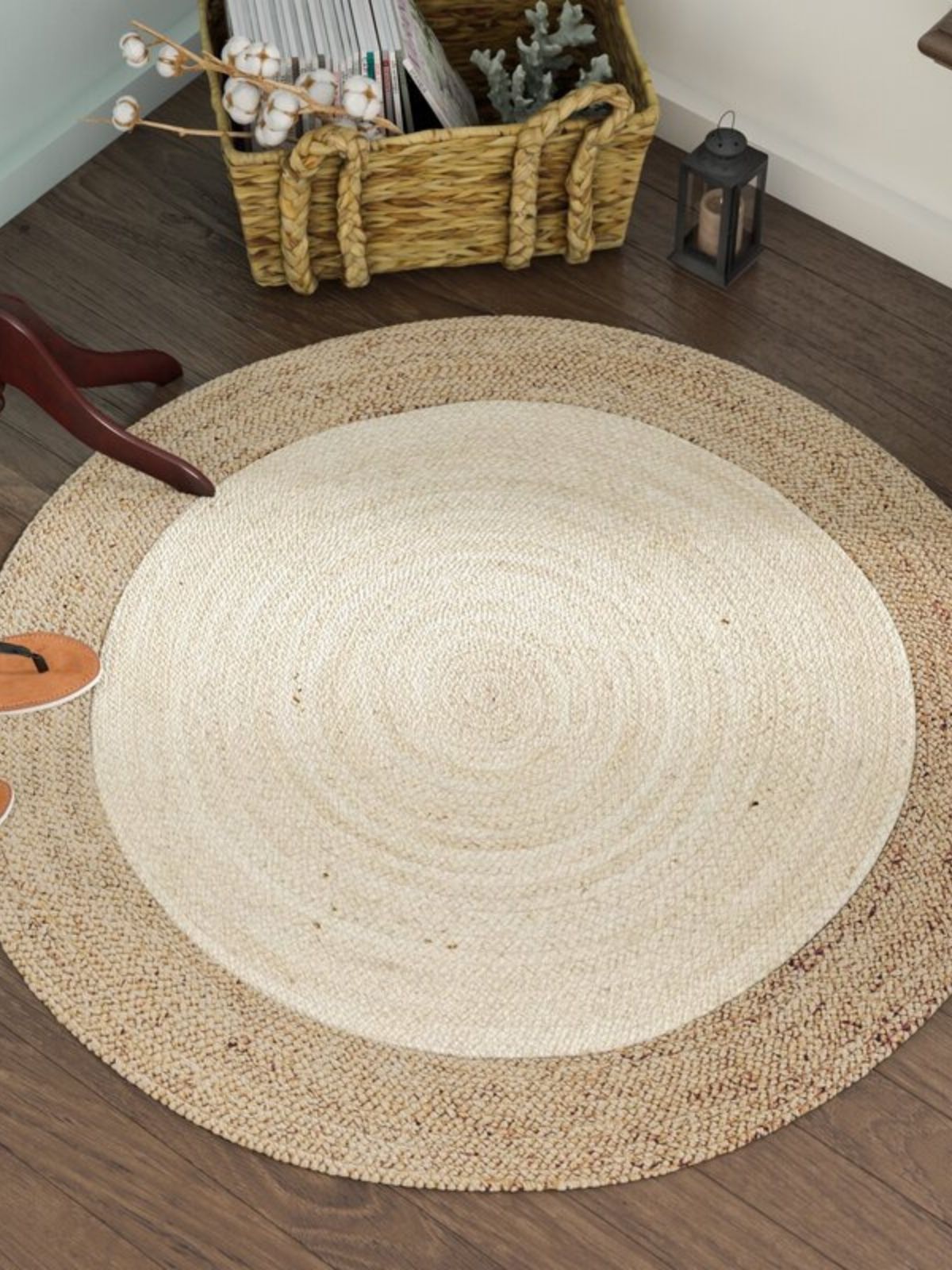Asmara bordered round rug-Off White jute rug styled in a designed interior
