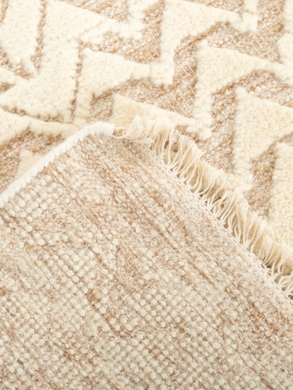 Beige Breeze Hand-Knotted Rug detail showing the textured wool surface and finishing