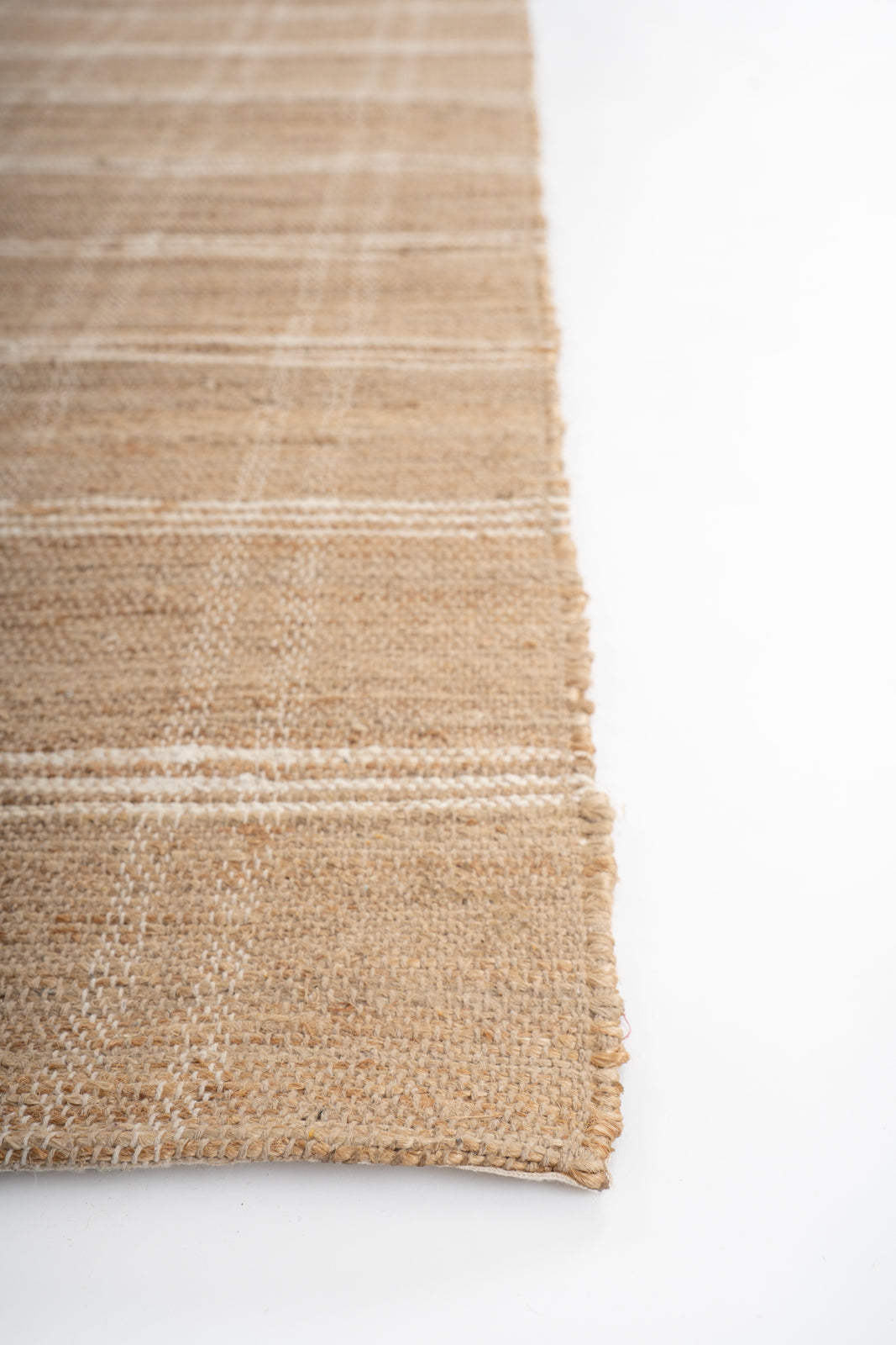 Benin striped Hemp area rug hemp rug styled in a living room interior