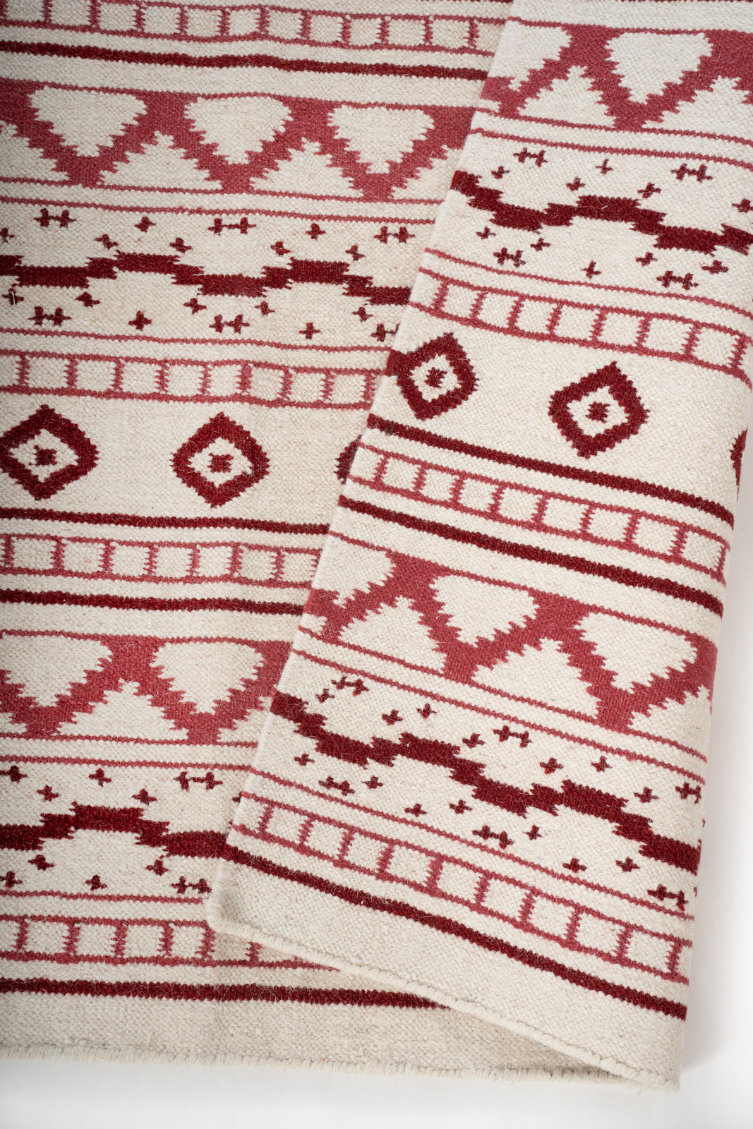 Bhuj Crimson Weave Rug detail of the traditional motif in wool