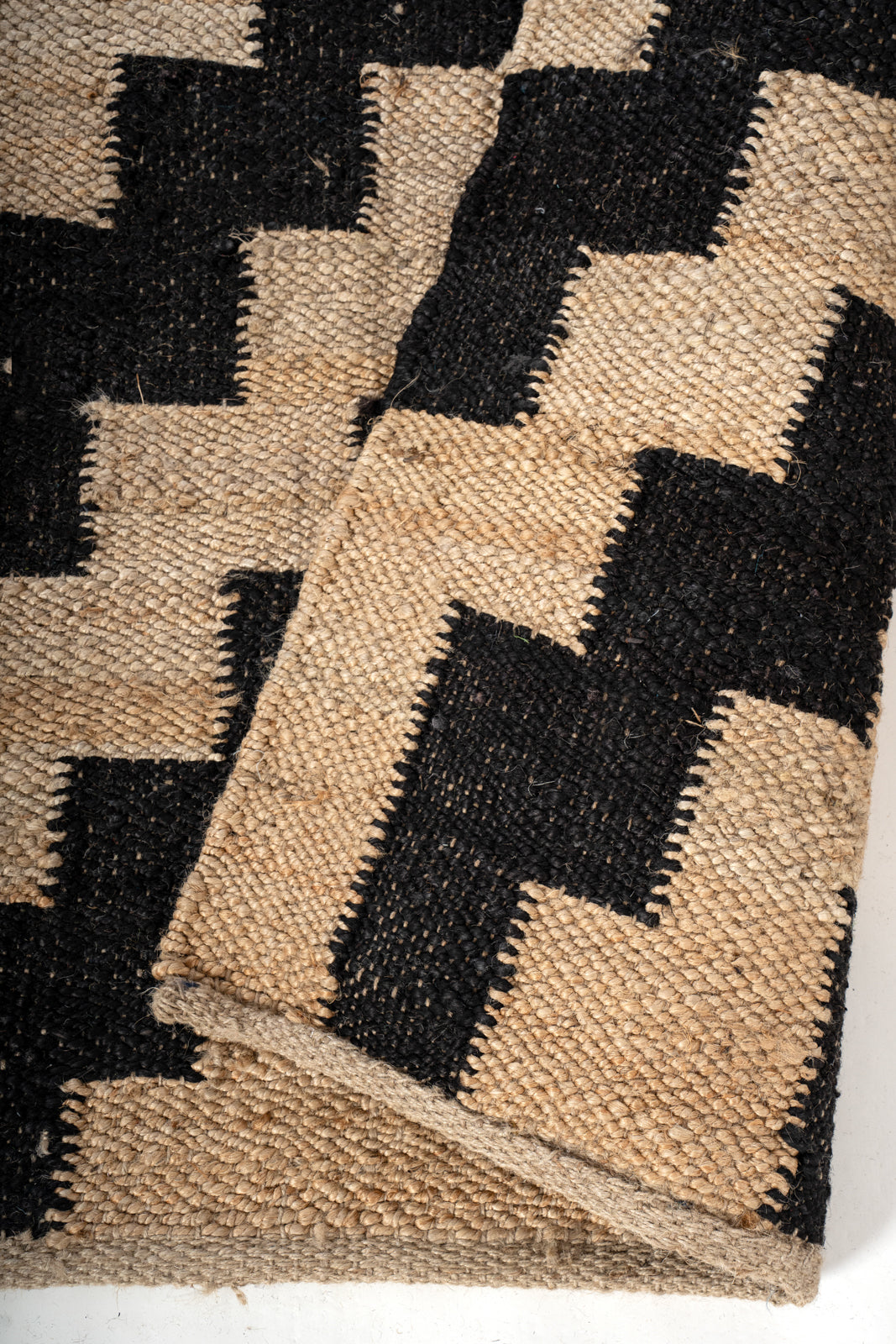 Black Geo Jute Rug detail of the geometric pattern in jute