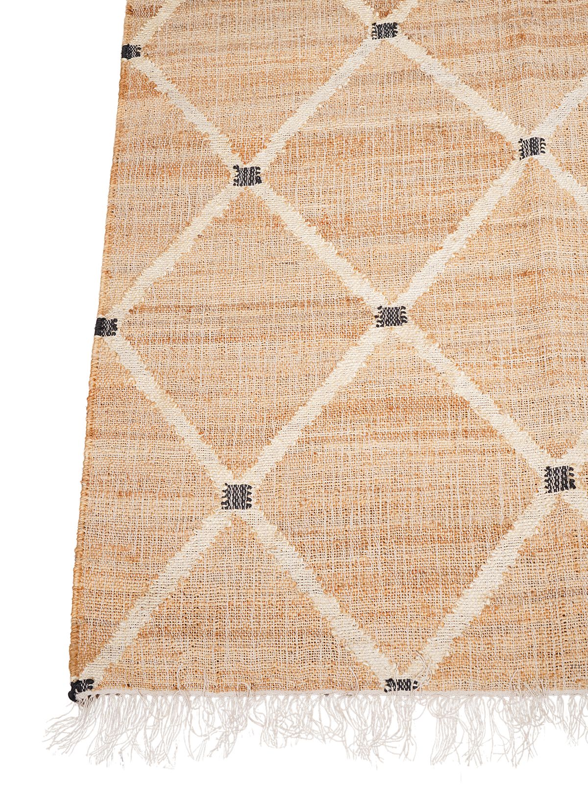 Black & White Natural Diamond Rug jute rug styled in a living room interior