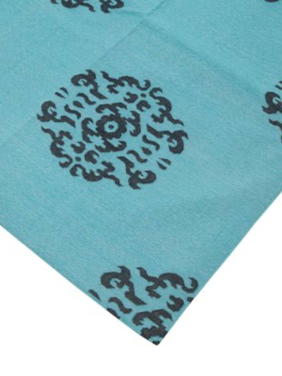 Blue Medallion Cotton Rug close-up showing the cotton weave and traditional motif