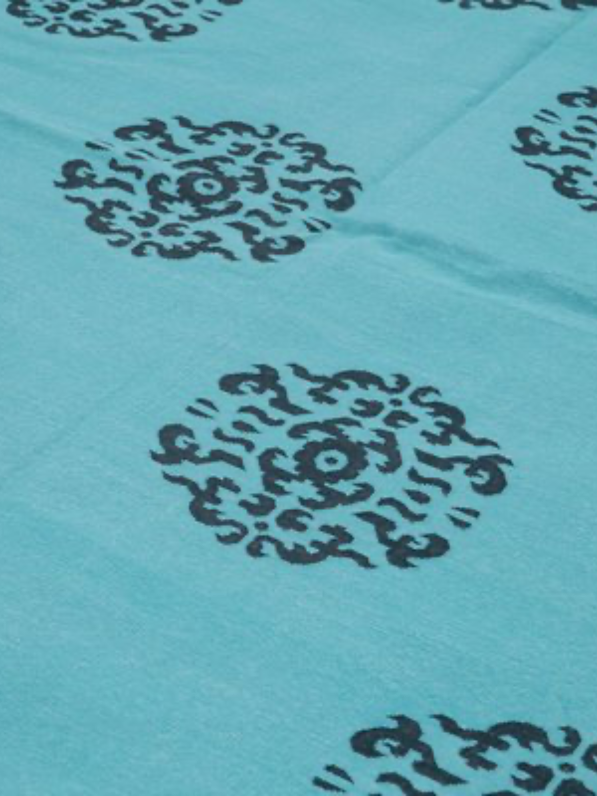 Blue Medallion Cotton Rug detail of the traditional motif in cotton