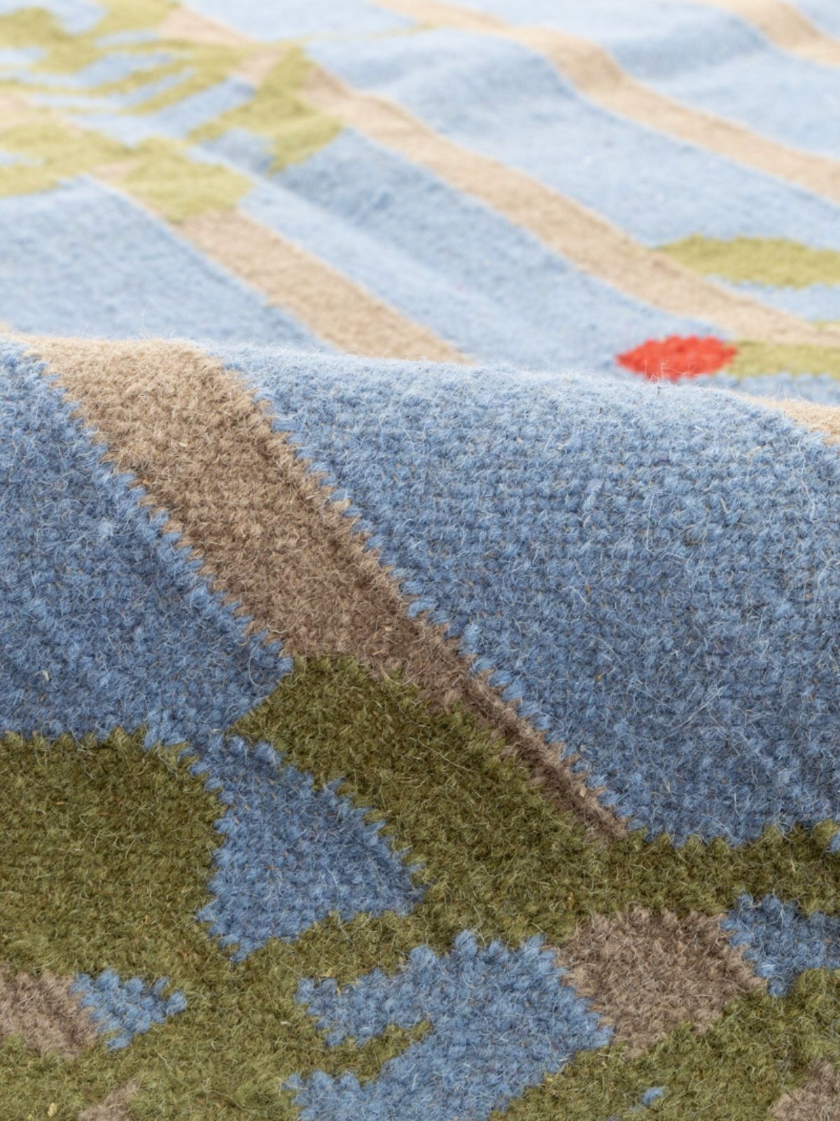 Bluebell Vine Flatweave Rug detail of the floral motif in cotton cut pile