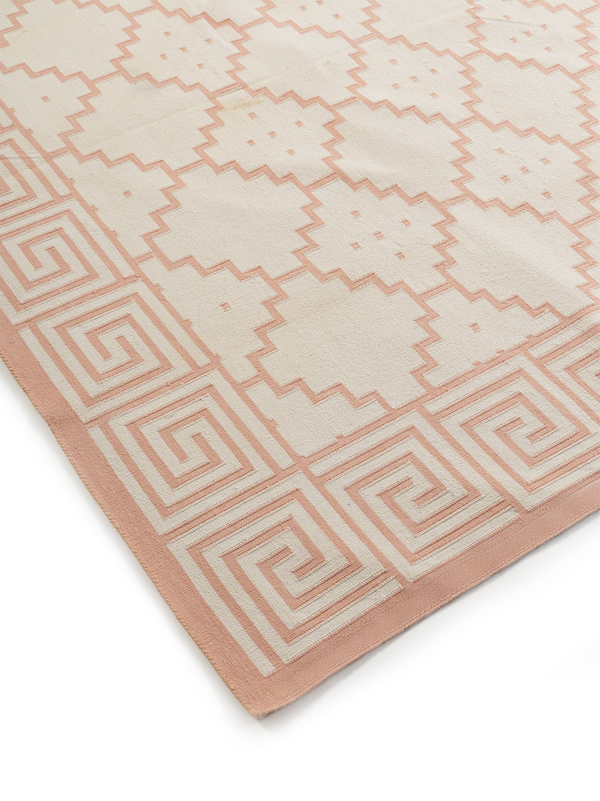 Blush Maze Dhurrie Rug close-up showing the cotton weave and geometric motif