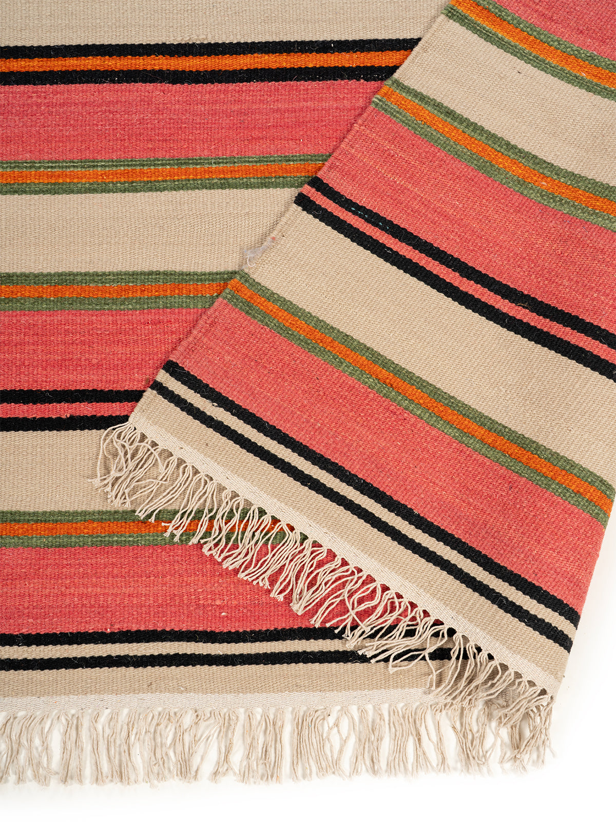 Blush & Terracotta Stripe Rug detail of the striped wool surface and edge finishing