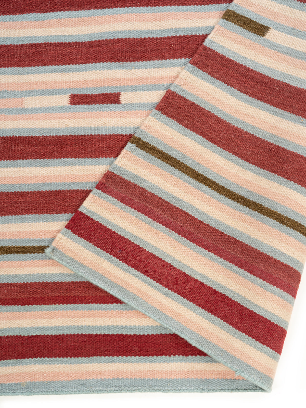 Bohemian Dash Stripe Rug detail of the striped wool surface and edge finishing