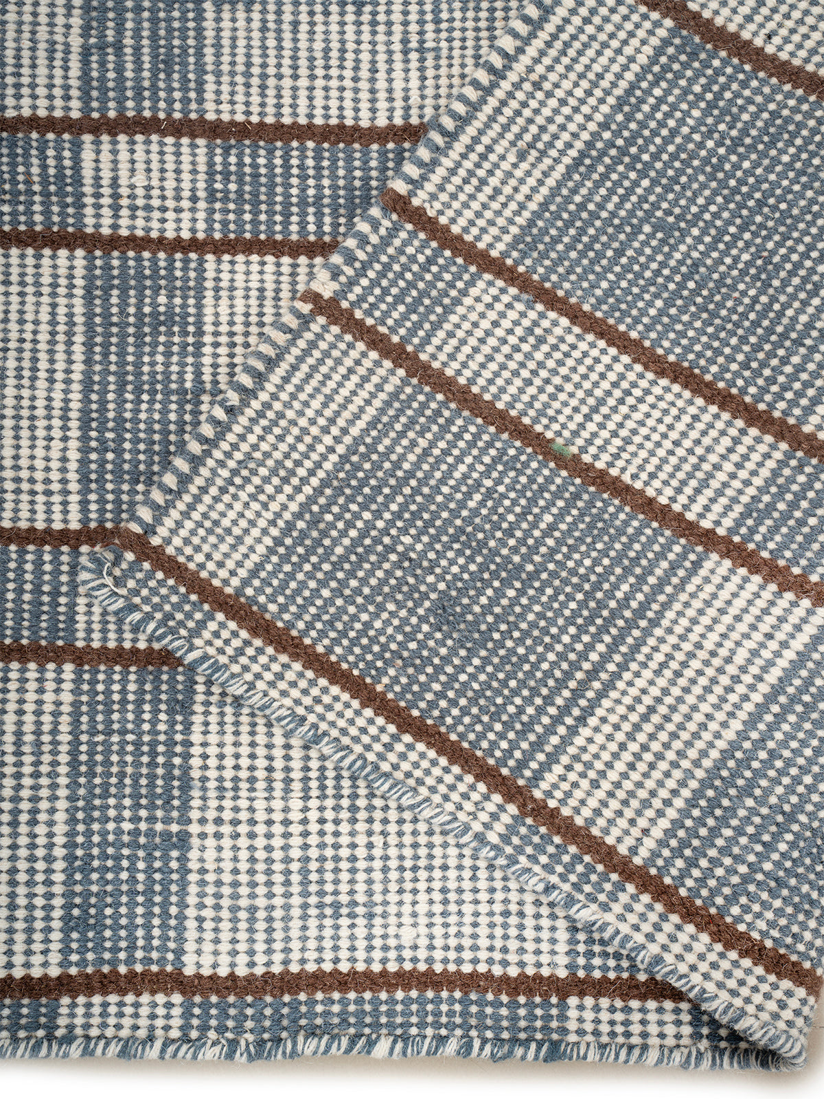 Calm Check Handwoven Wool Rug detail of the geometric pattern in wool
