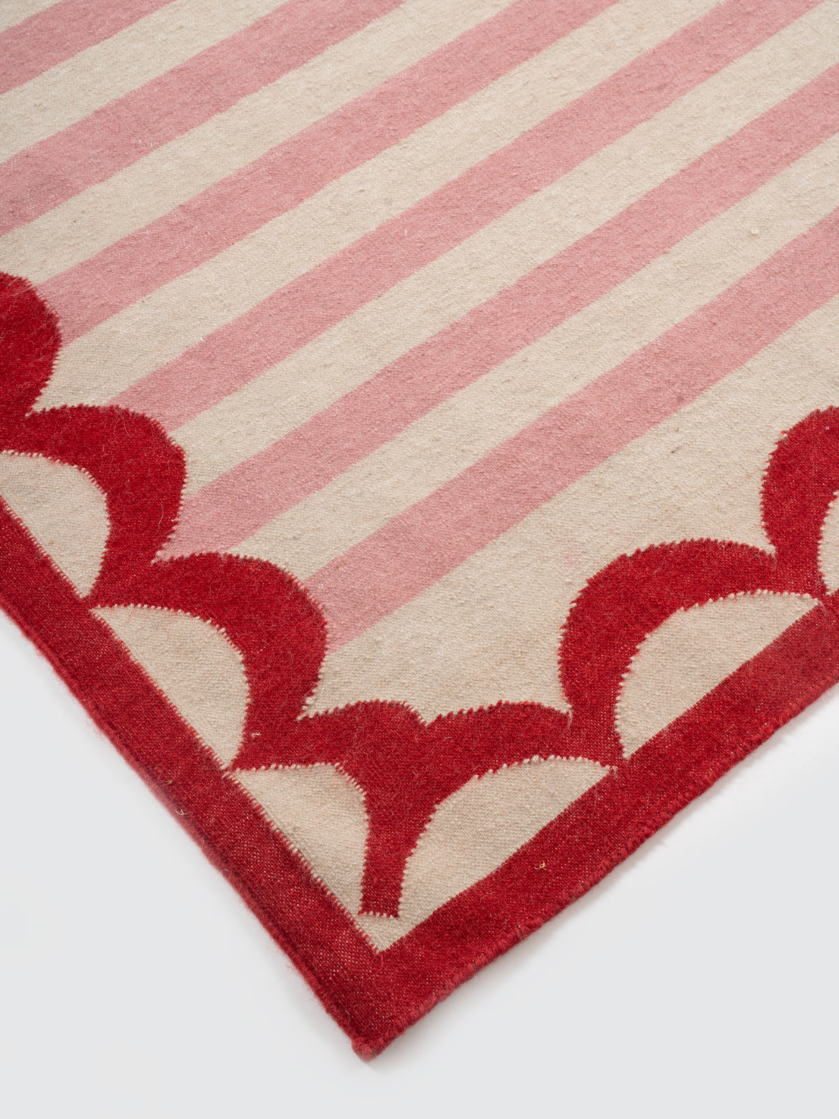 Carousel Stripe Wool Rug close-up showing the wool weave and striped pattern