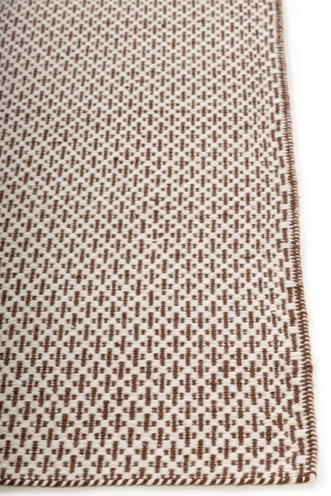 Cedarhue Flatweave wool rug styled in a living room interior