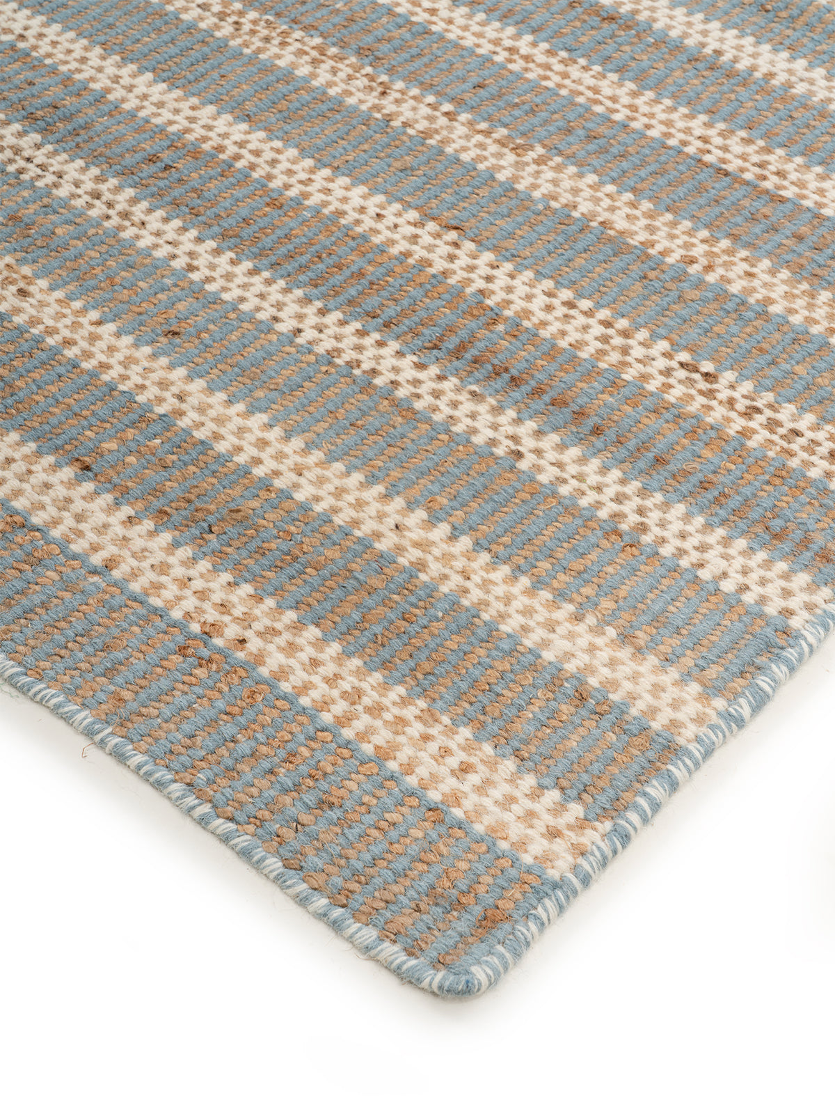 Charcoal Geometric Handloom Rug close-up showing the wool weave and geometric motif