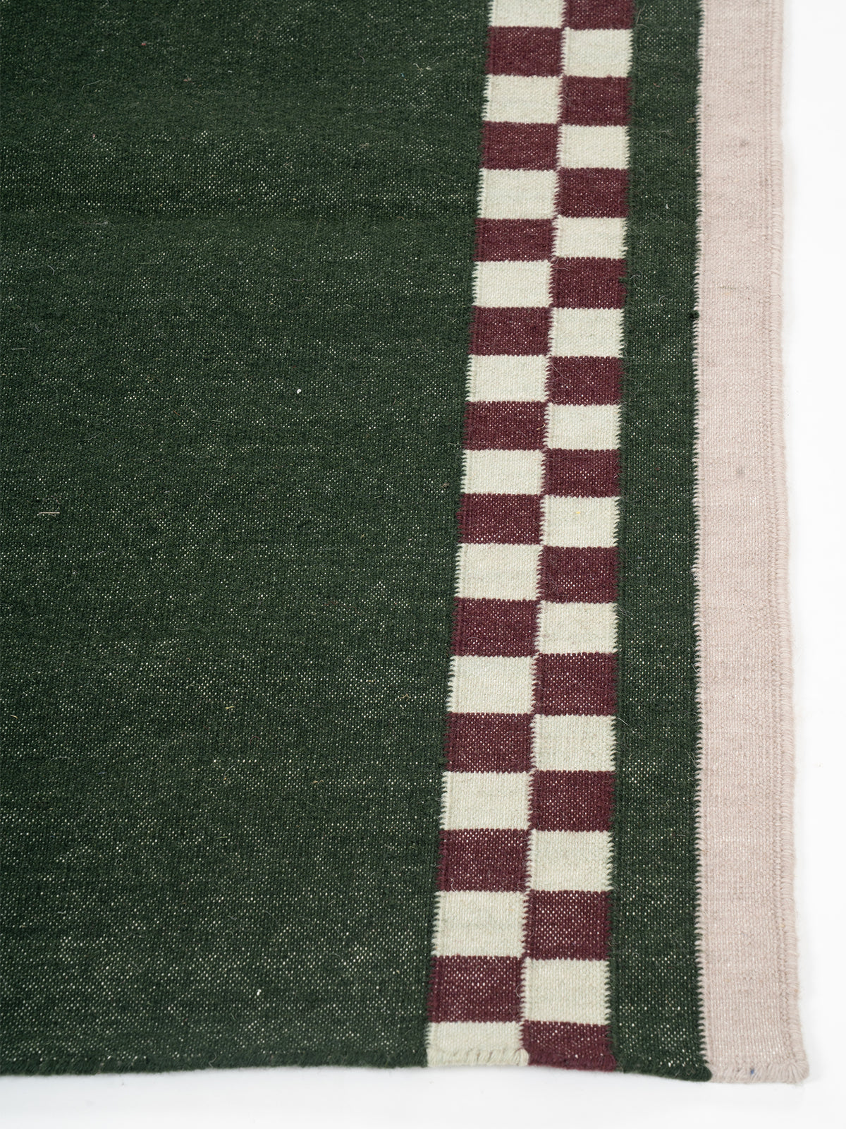 Checkerboard Stream Runner-Sage - cotton runner laid in a hallway view