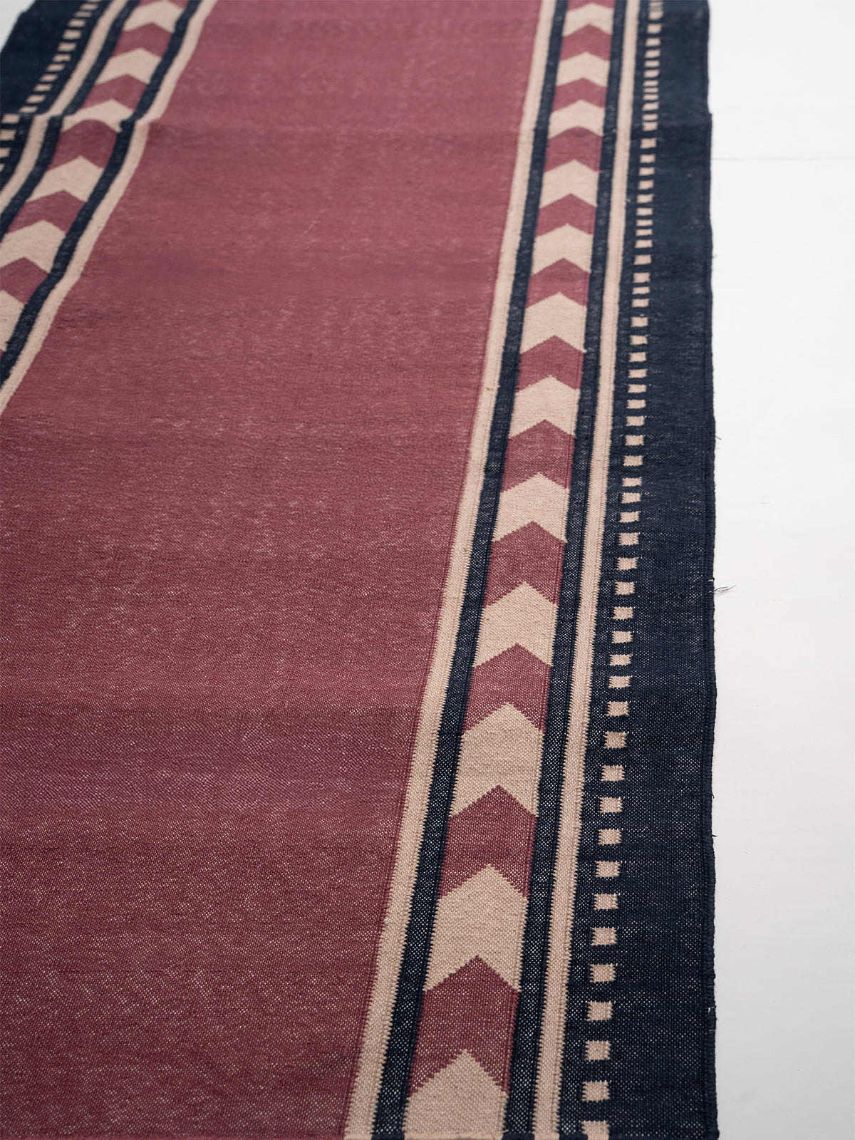 Cherry Moor Runner - wool runner laid in a hallway view
