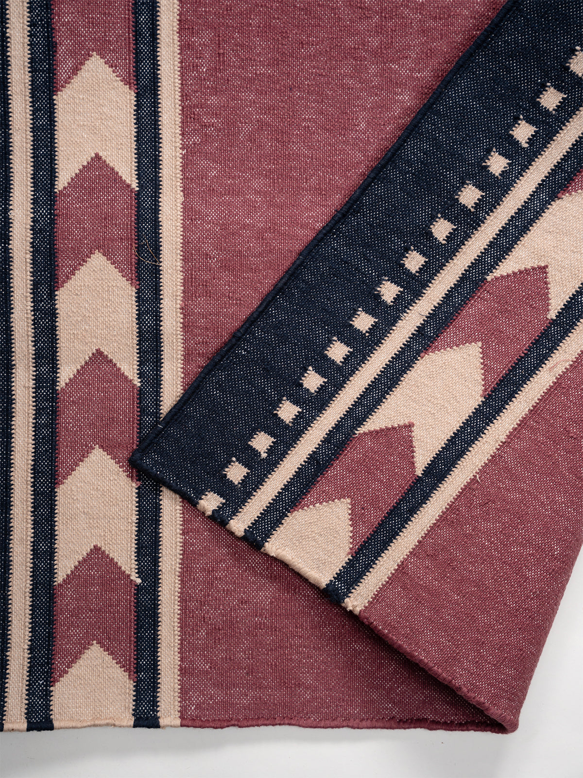 Cherry Moor Runner detail showing edge binding and wool finishing of the runner