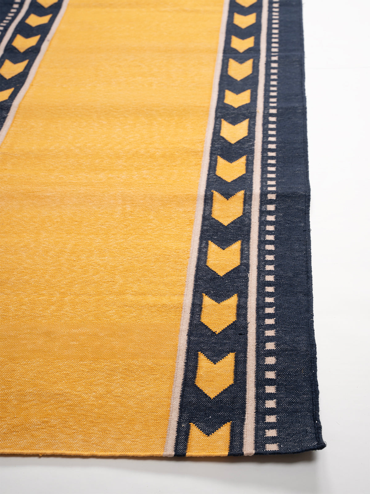 Chrome Moor Runner - cotton runner laid in a hallway view