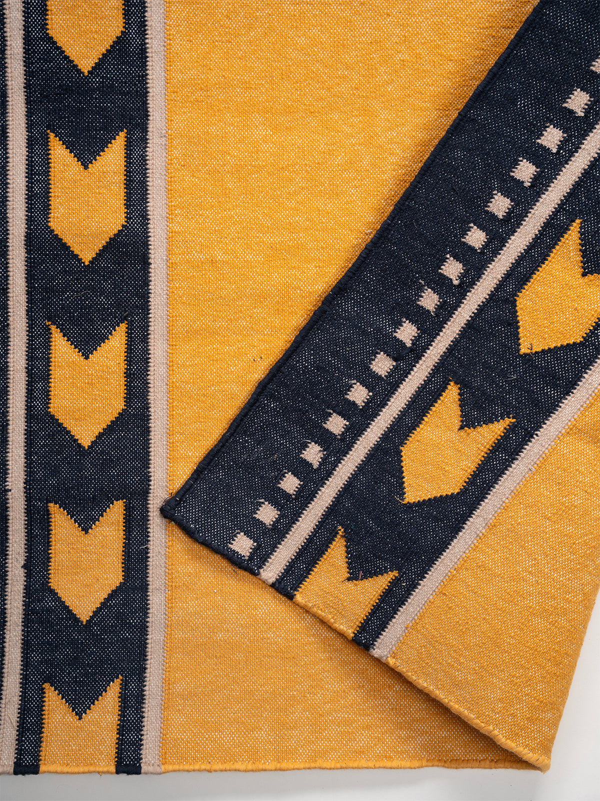 Chrome Moor Runner detail showing edge binding and cotton finishing of the runner