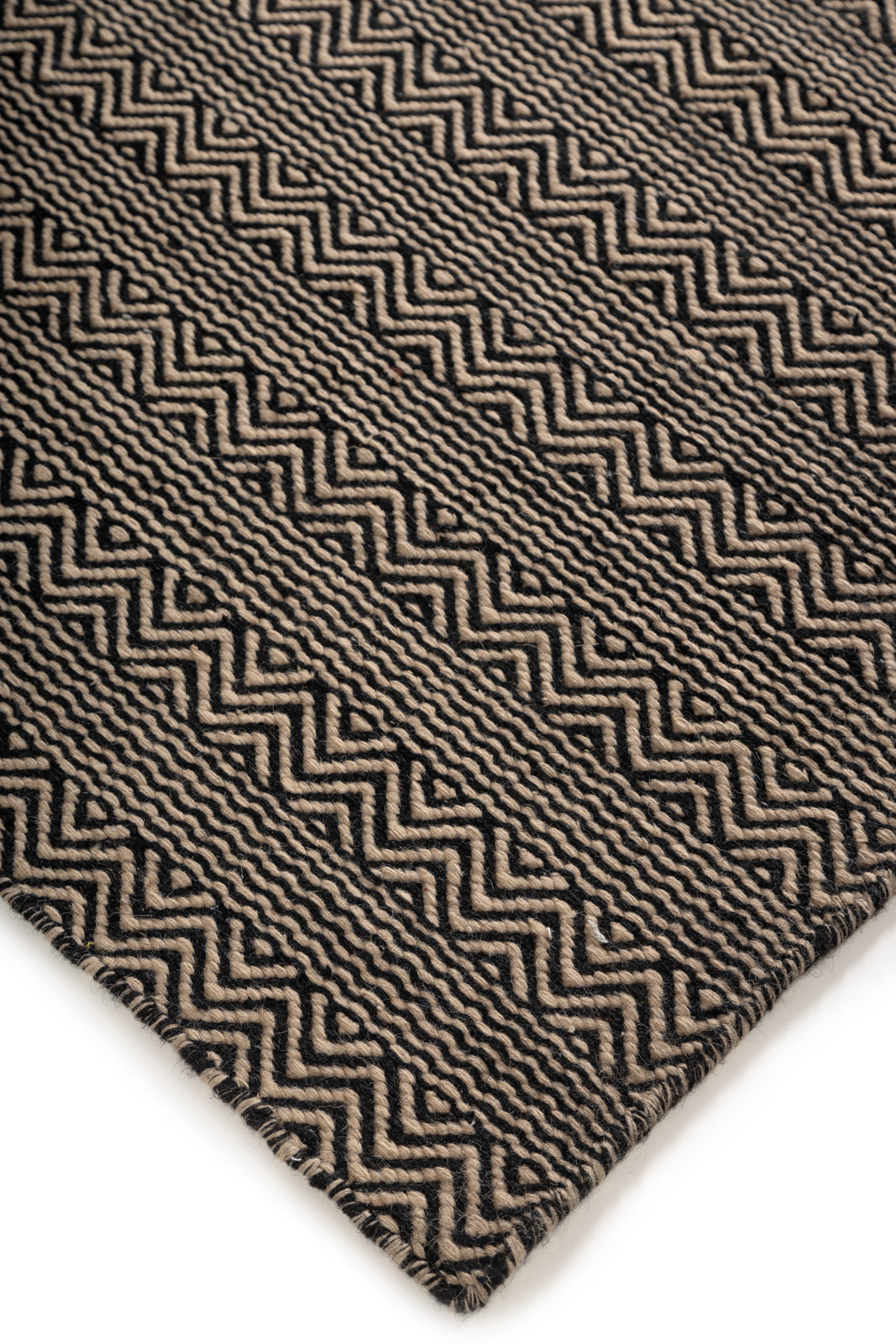 Claybourne Shuttle Rug close-up showing the wool weave and surface texture