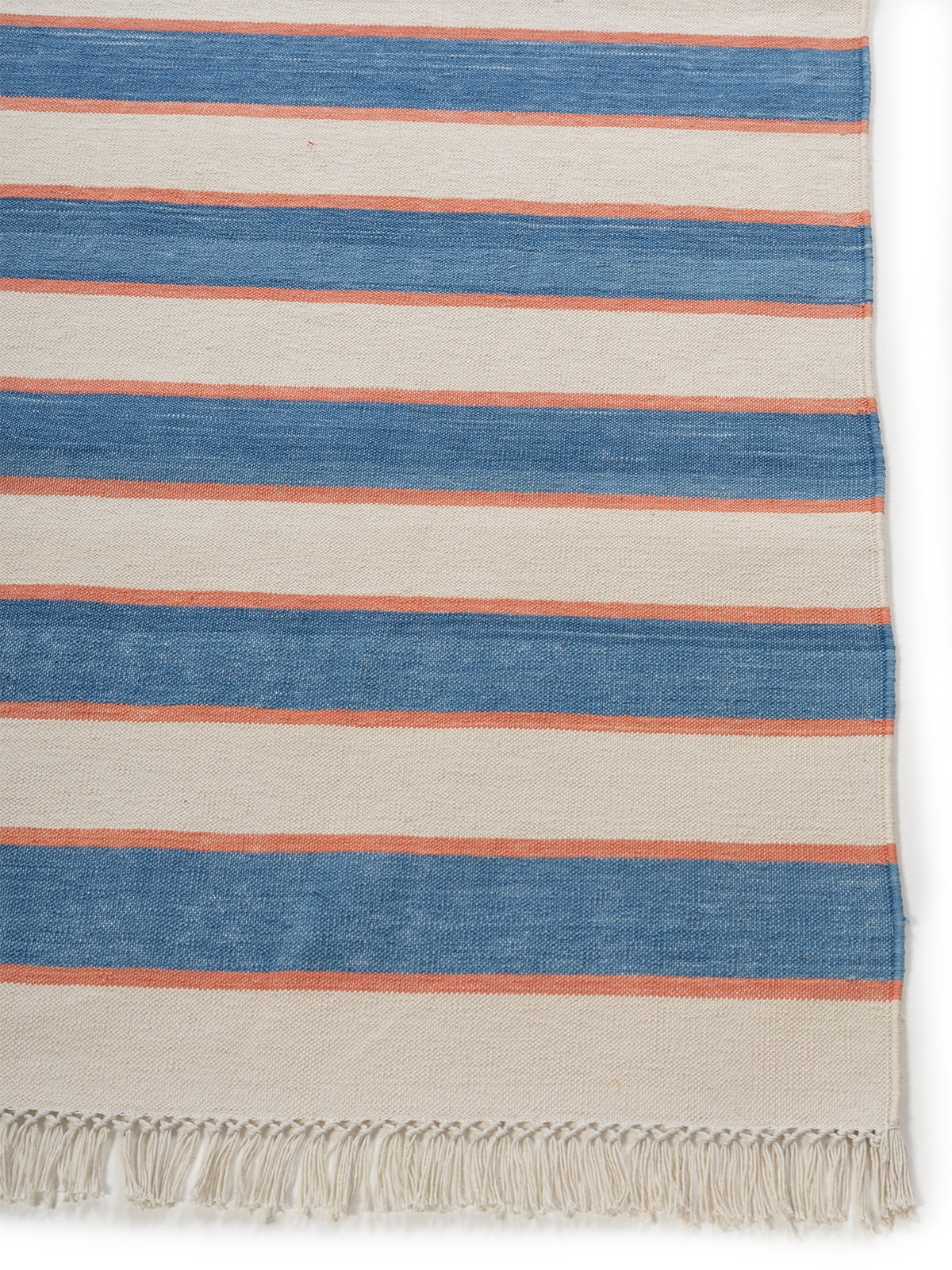 Coastal Breeze Dhurrie cotton rug styled in a living room interior