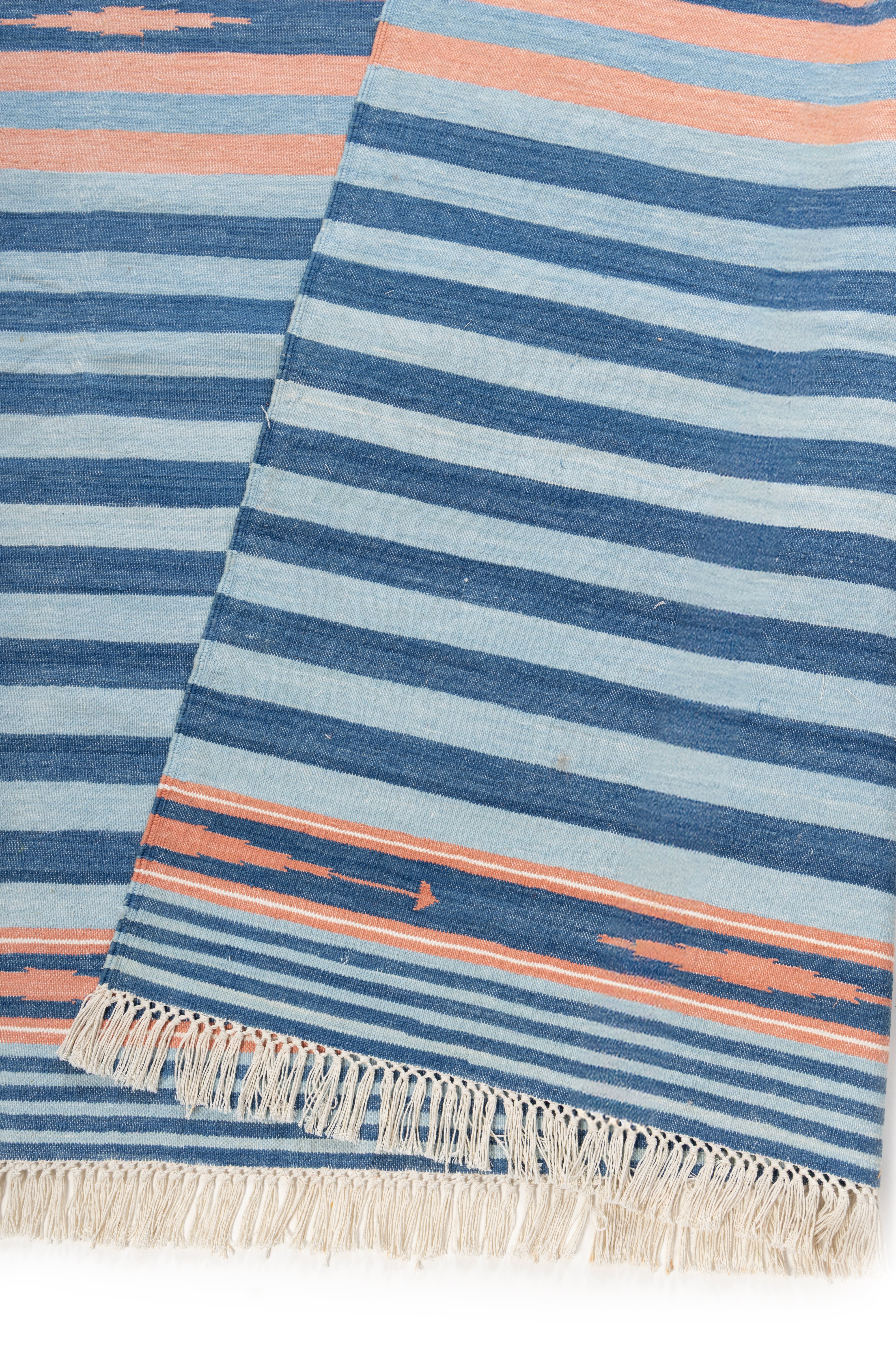 Coastal Dusk Stripe Dhurrie Rug detail of the striped cotton surface and edge finishing