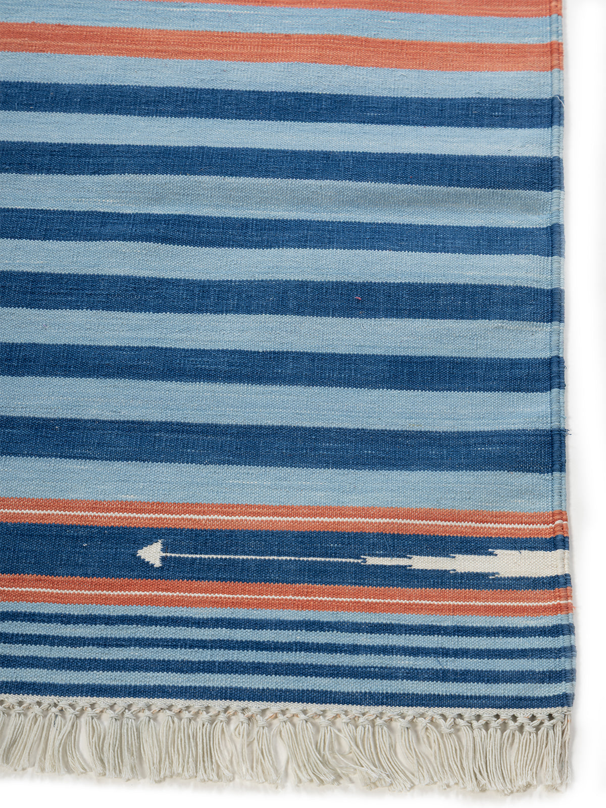 Coastal Stride Rug cotton rug styled in a living room interior