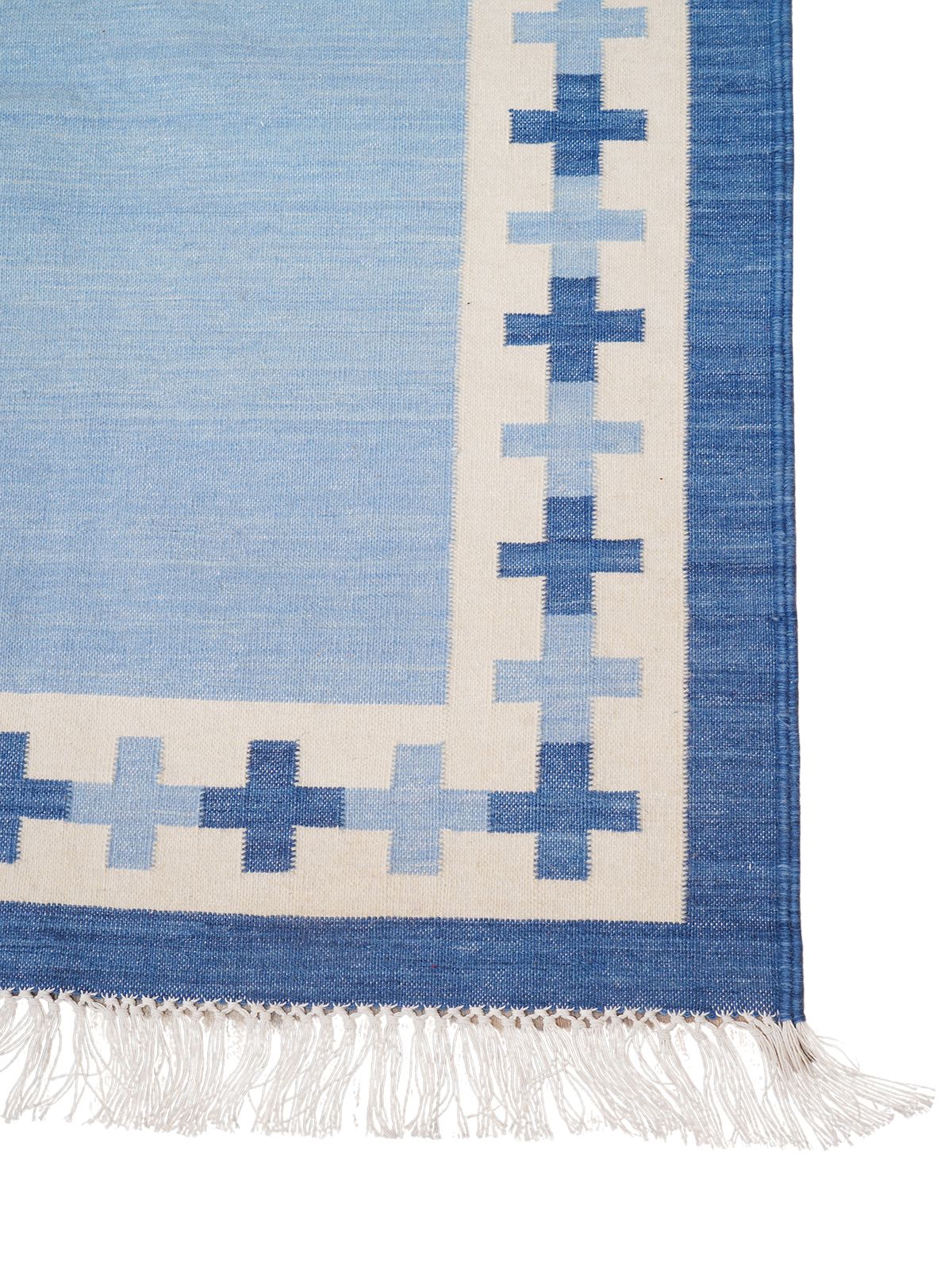 Cobalt Comfort Flatweave Rug-Blue cotton rug styled in a living room interior