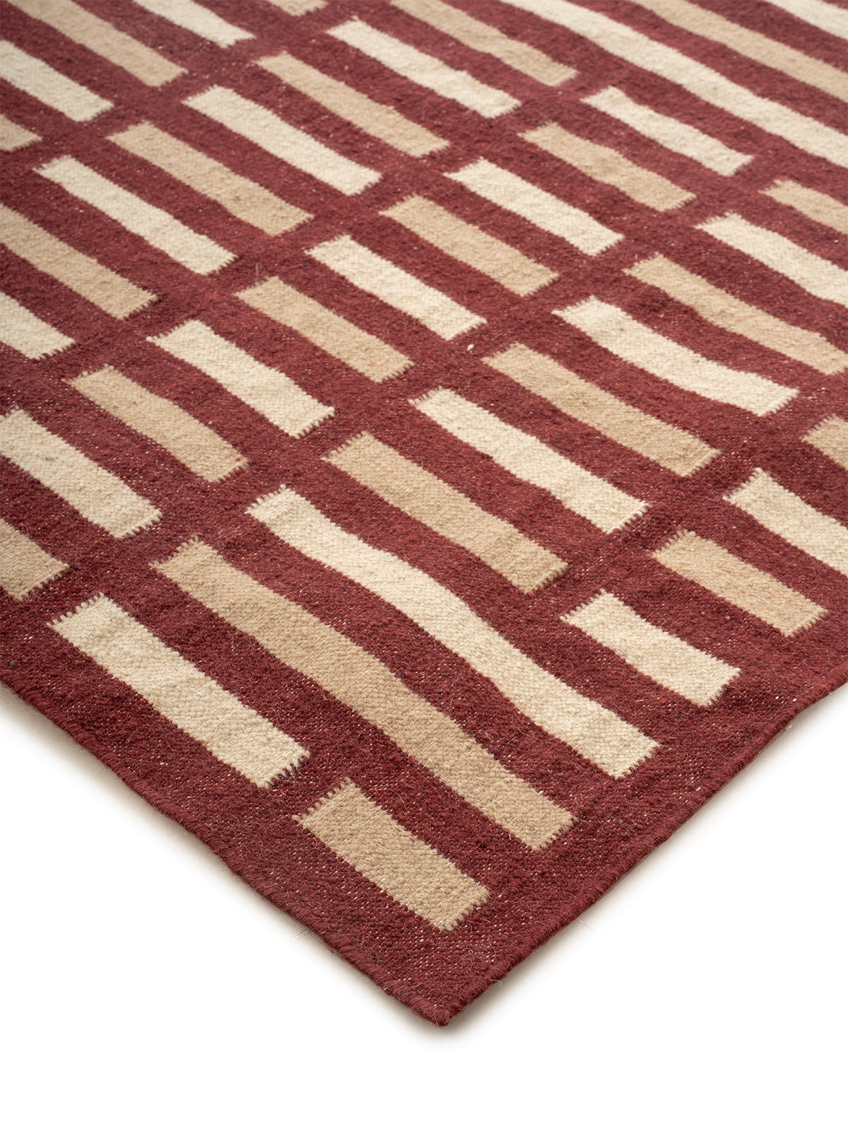Cobblestone Path Wool Rug-Burgundy close-up showing the wool weave and geometric motif