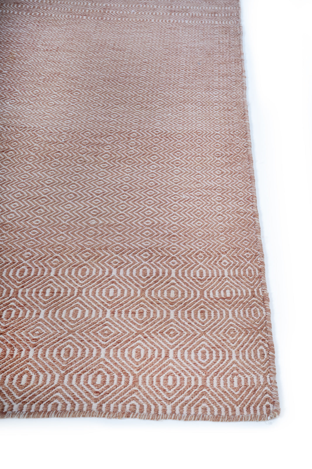 Crimson Cascade handloom rug wool rug styled in a living room interior