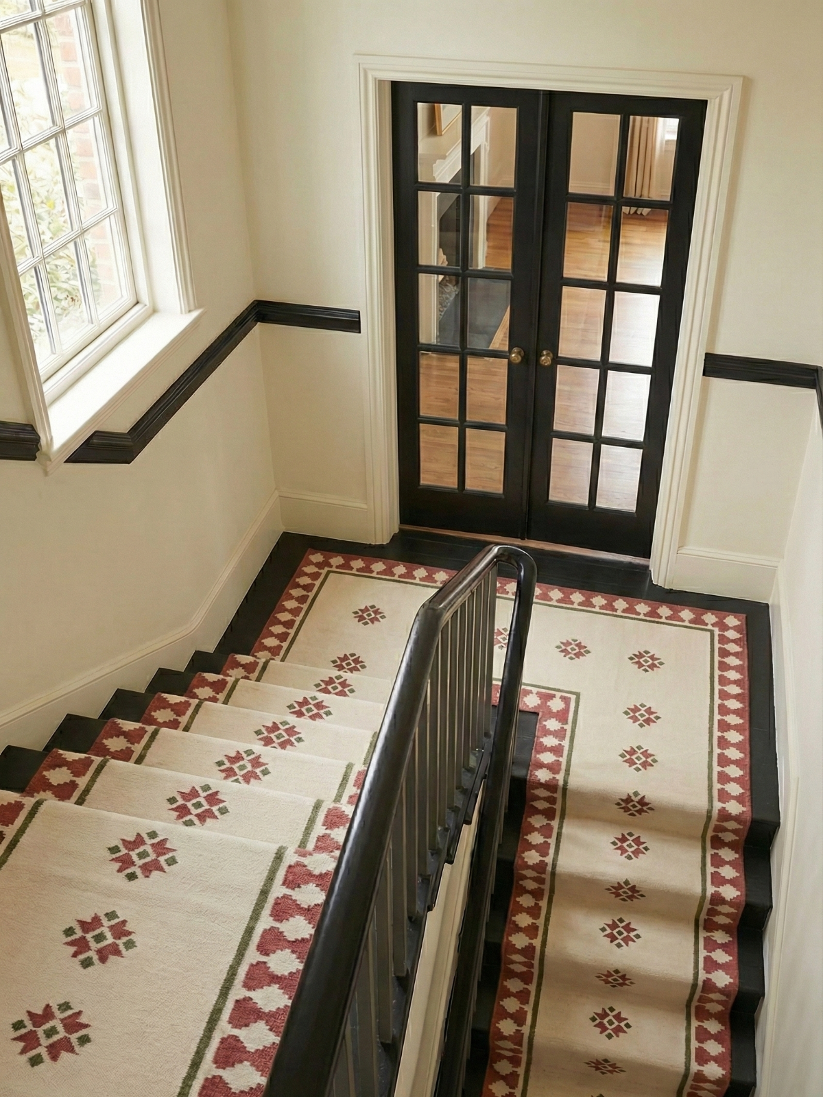 Crimson Crossroads wool rug styled in a living room interior