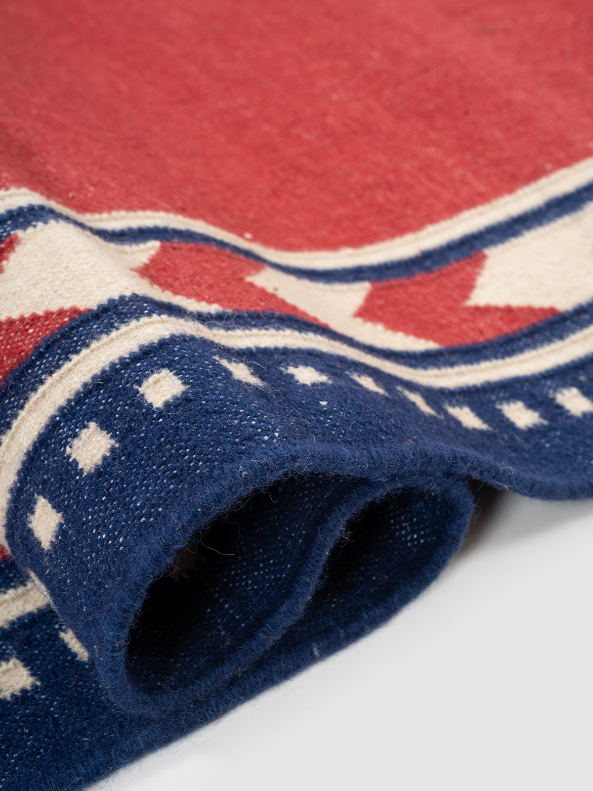 Crimson Moor Runner - cotton runner laid in a hallway view
