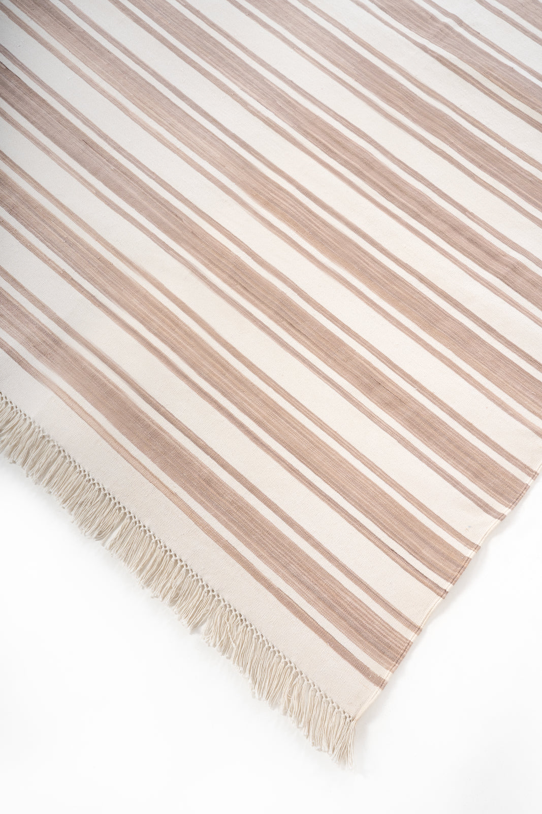Darjeeling Drift Flatweave Rug close-up showing the cotton weave and striped pattern