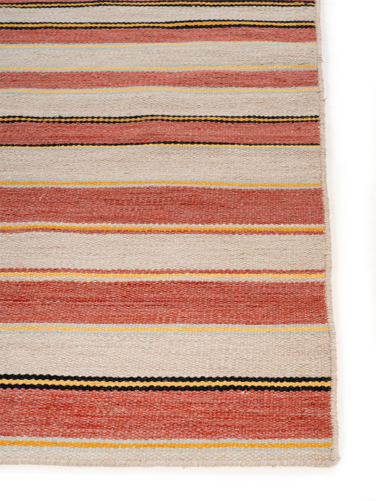 Desert Sunset Stripe Wool Flatweave wool rug styled in a living room interior