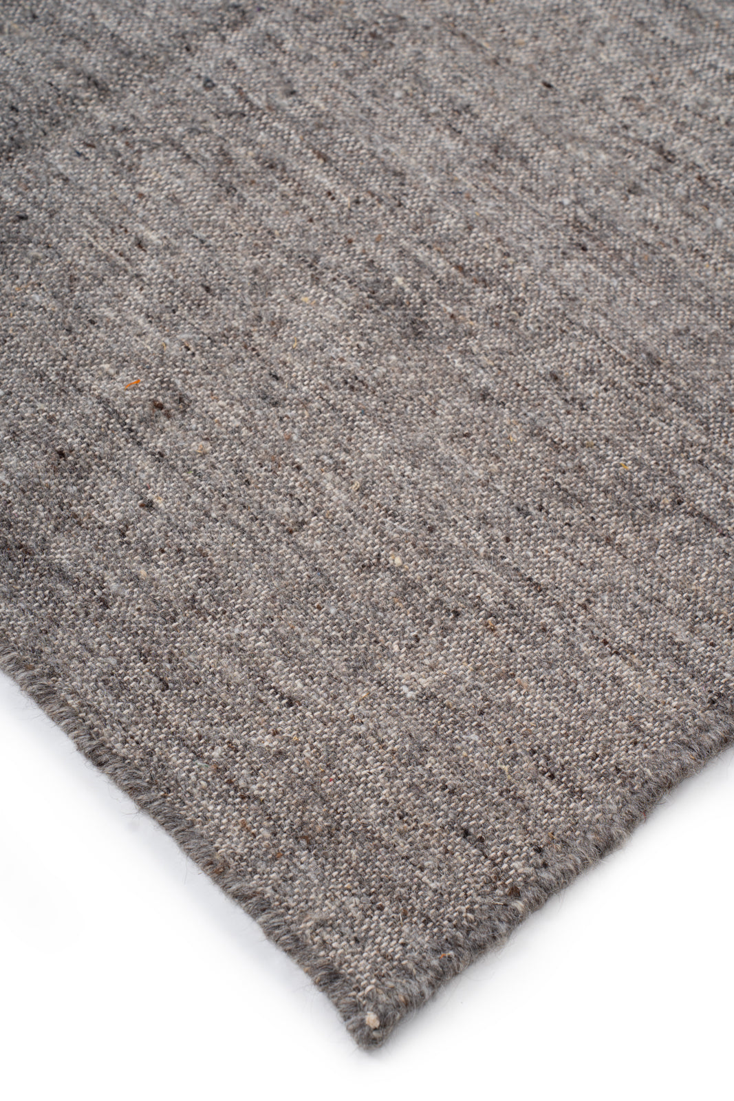 Earthen Essence Grey Wool Rug close-up showing the wool weave and surface texture