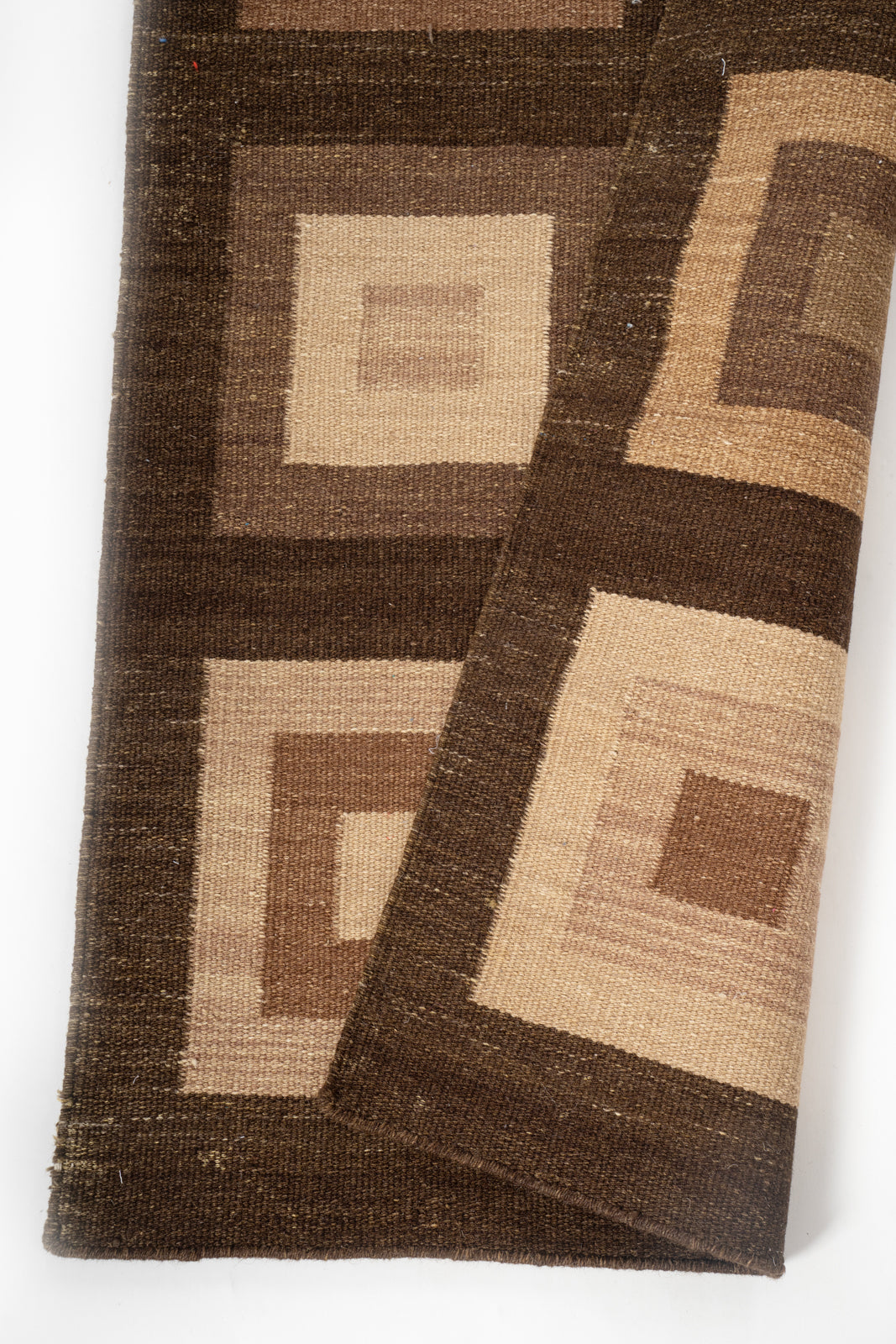 Earthy Geometric Wool Runner detail showing edge binding and wool finishing of the runner