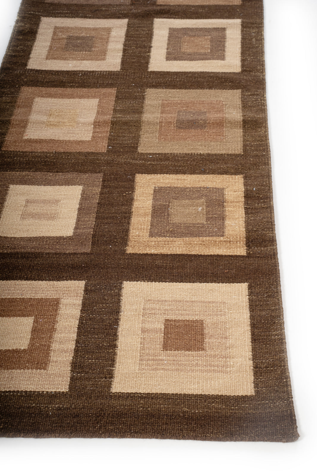 Earthy Geometric Wool Runner wool stair runner styled on a staircase in a designed interior