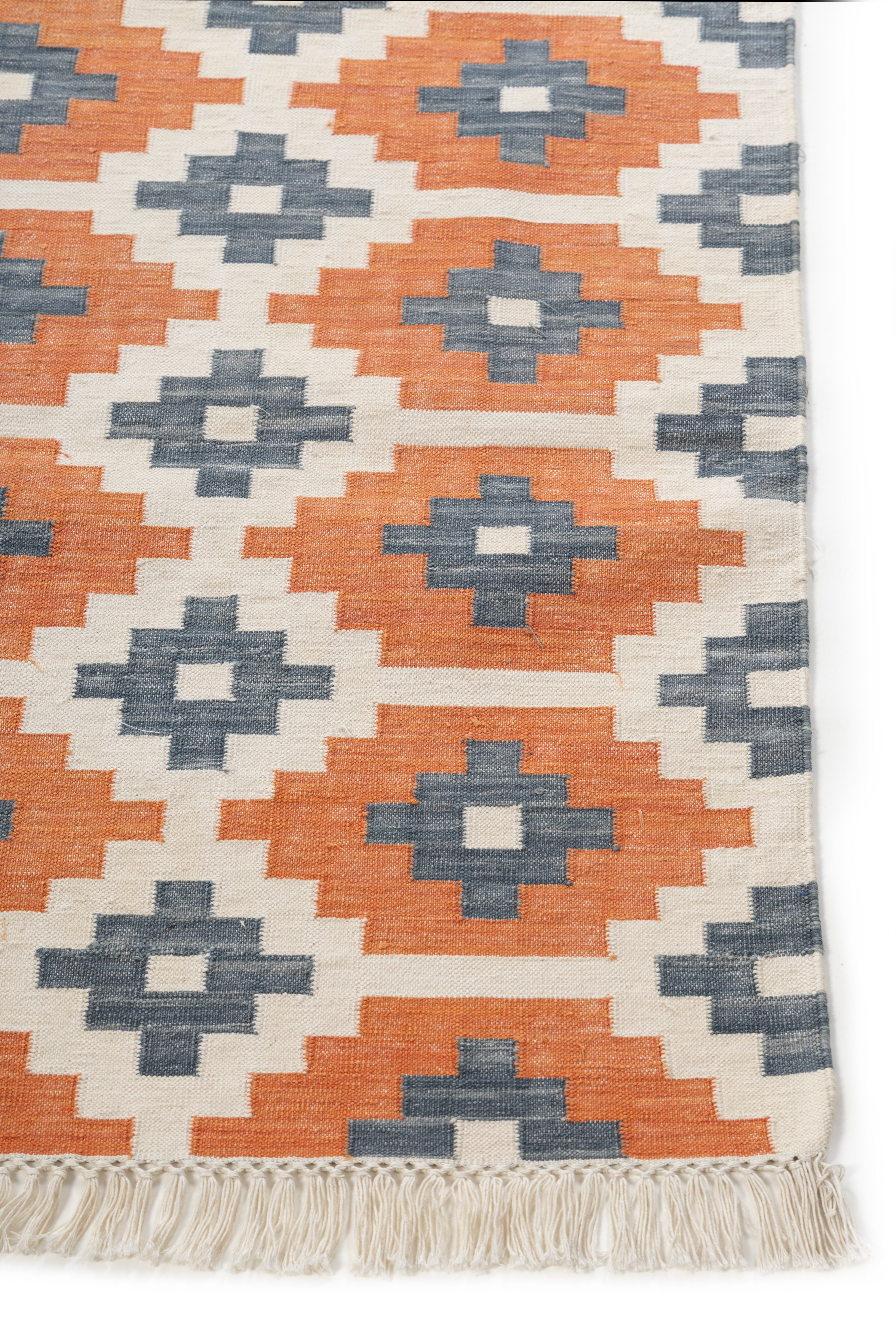 Ember Echo Kilim Rug cotton rug styled in a living room interior