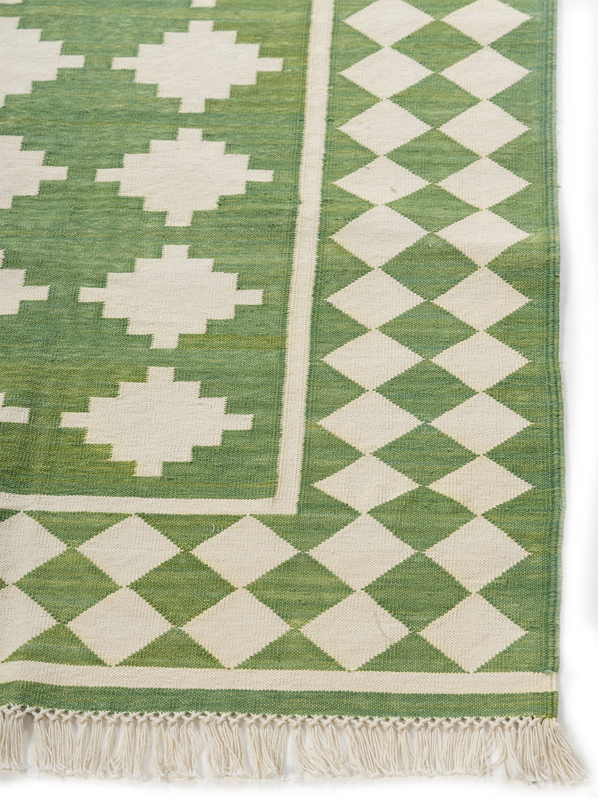 Emerald Echo cotton rug styled in a living room interior