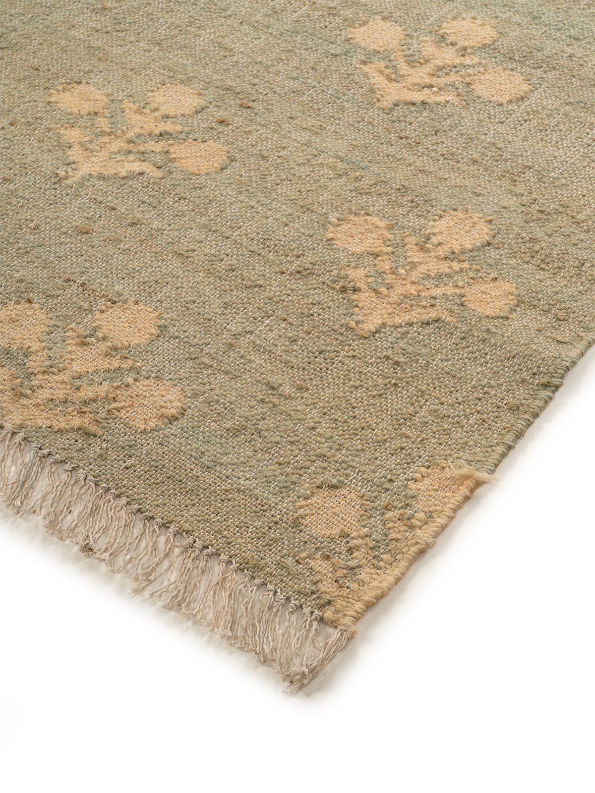 Fern Valley Jute Rug close-up showing the jute pile and floral motif